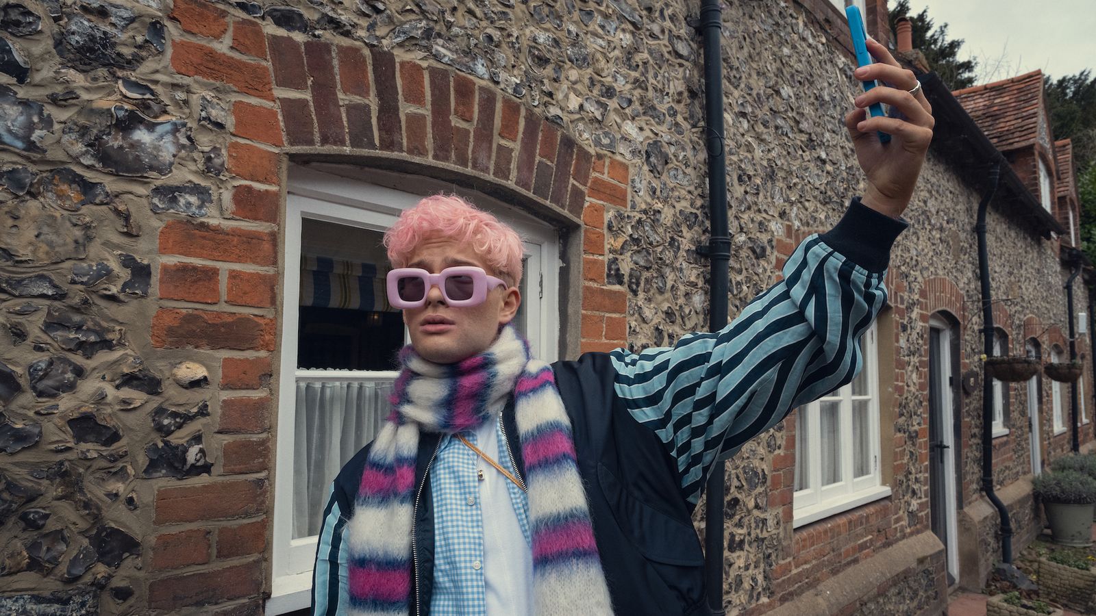 Image may contain Face Head Person Photography Portrait Brick City Road Street Urban Accessories and Glasses