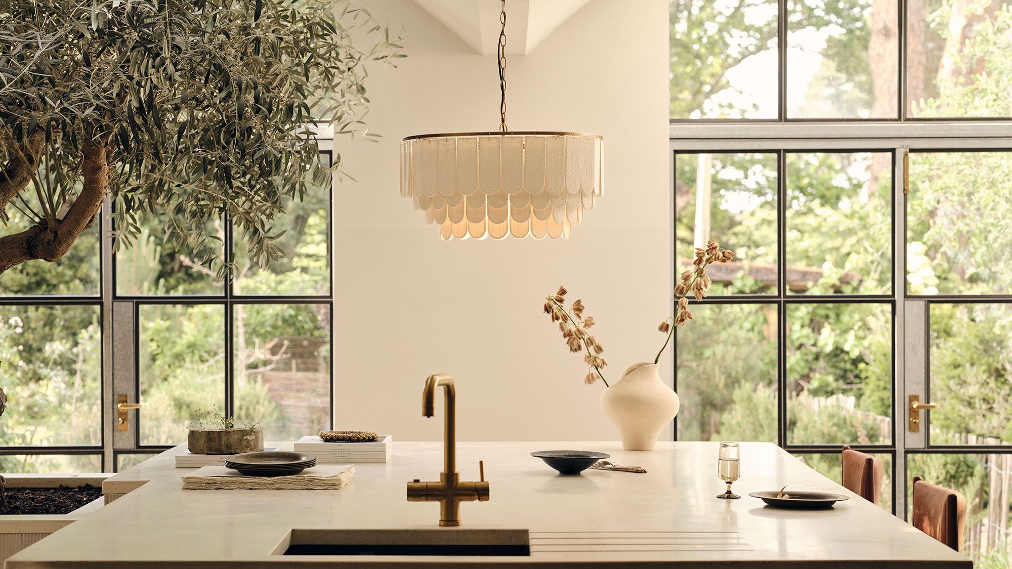 Image may contain: Indoors, Interior Design, Lamp, Architecture, Building, Dining Room, Dining Table, Furniture, and Room