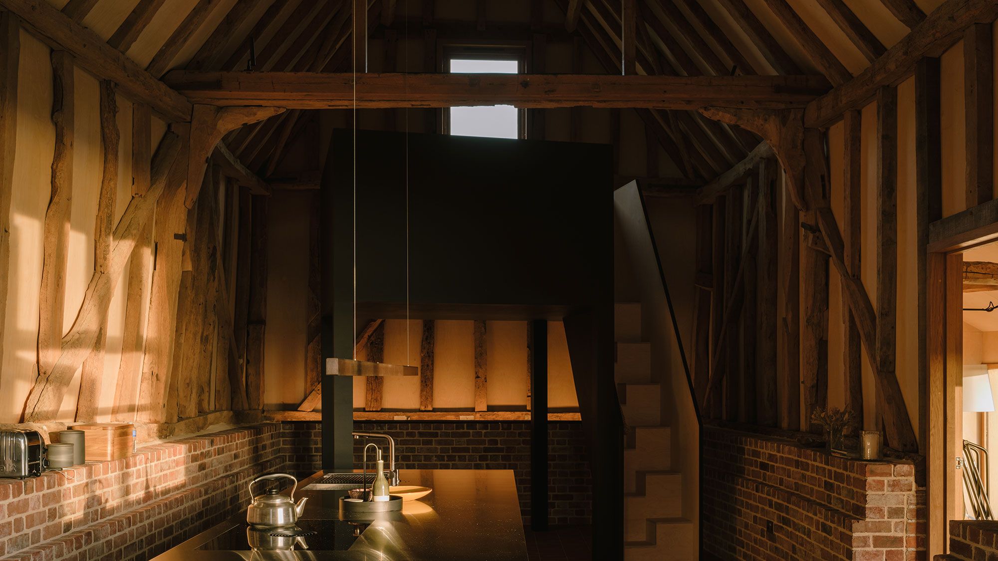 Image may contain: Indoors, Interior Design, Architecture, Building, House, Housing, Loft, Room, Sink, and Lamp