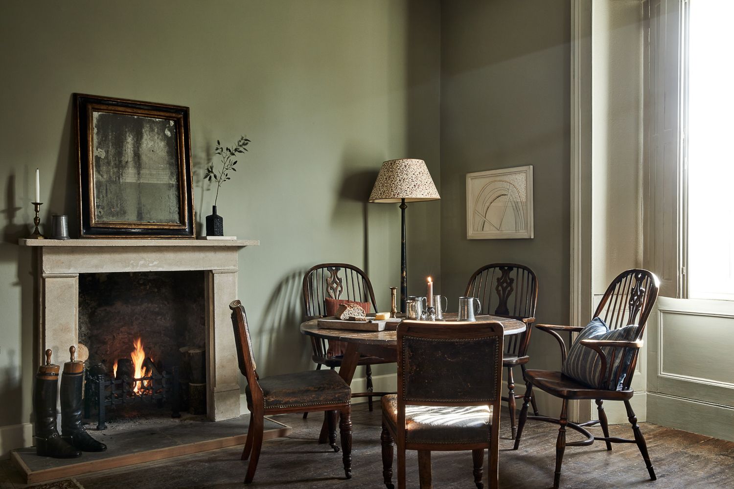 Image may contain Fireplace Indoors Architecture Building Dining Room Dining Table Furniture Room Table and Chair