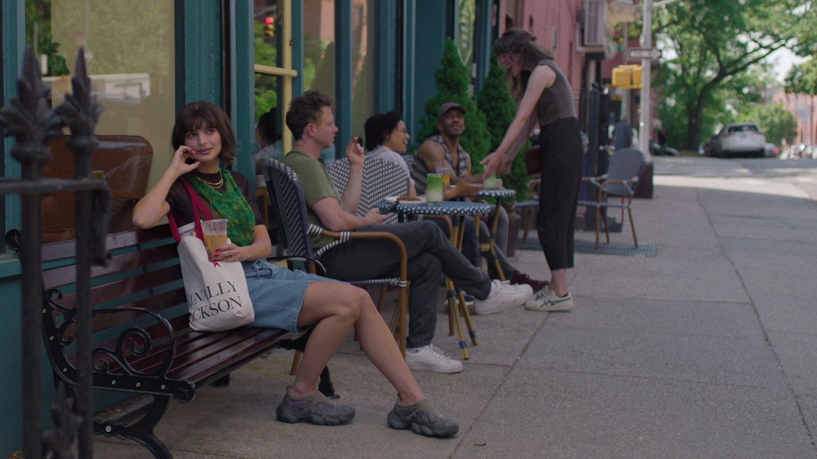 Image may contain Emily Ratajkowski Ian Ziering Nick Cannon Clothing Footwear Shoe Cup City Road Street and Urban