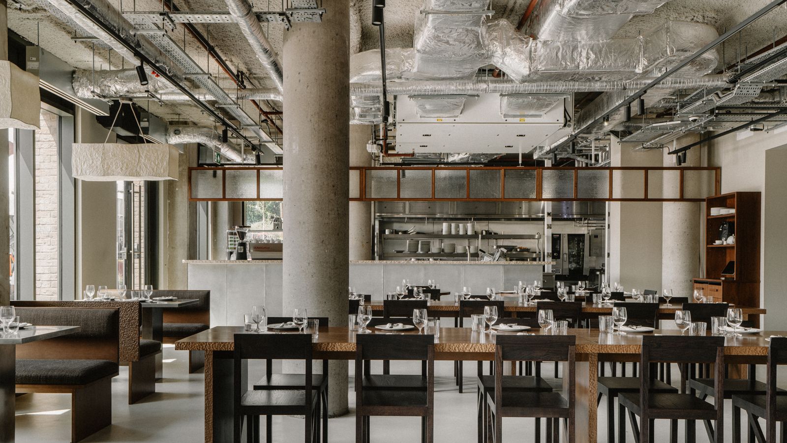 Image may contain: Indoors, Restaurant, Dining Table, Furniture, Table, Architecture, Building, Dining Room, and Room