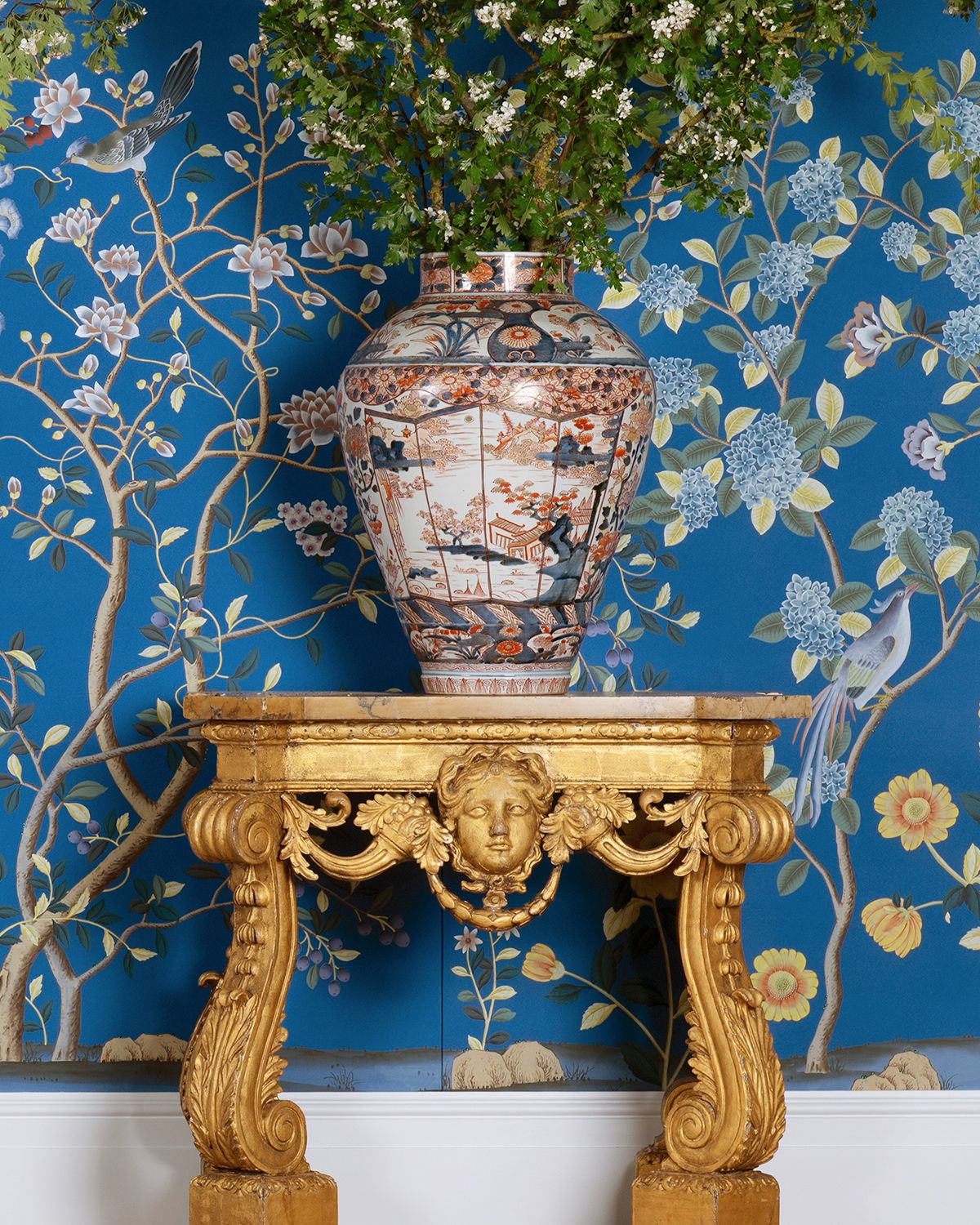 Image may contain: Phidias, Jar, Pottery, Vase, Person, Indoors, Interior Design, Art, Cookware, Pot, Desk, and Furniture