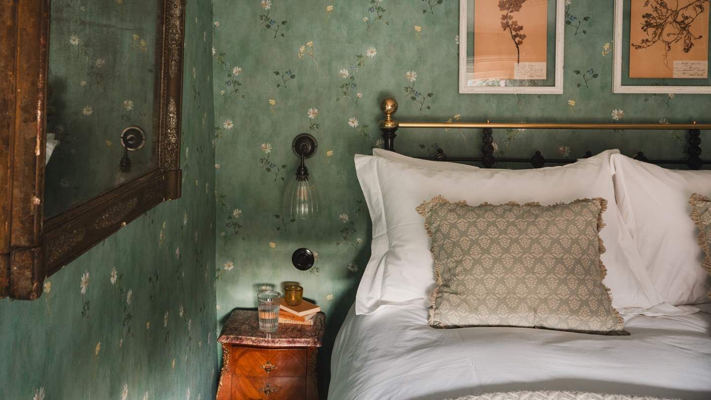 Image may contain Cushion Home Decor Indoors Interior Design Bed Furniture Pillow Art Painting Cup Desk and Table