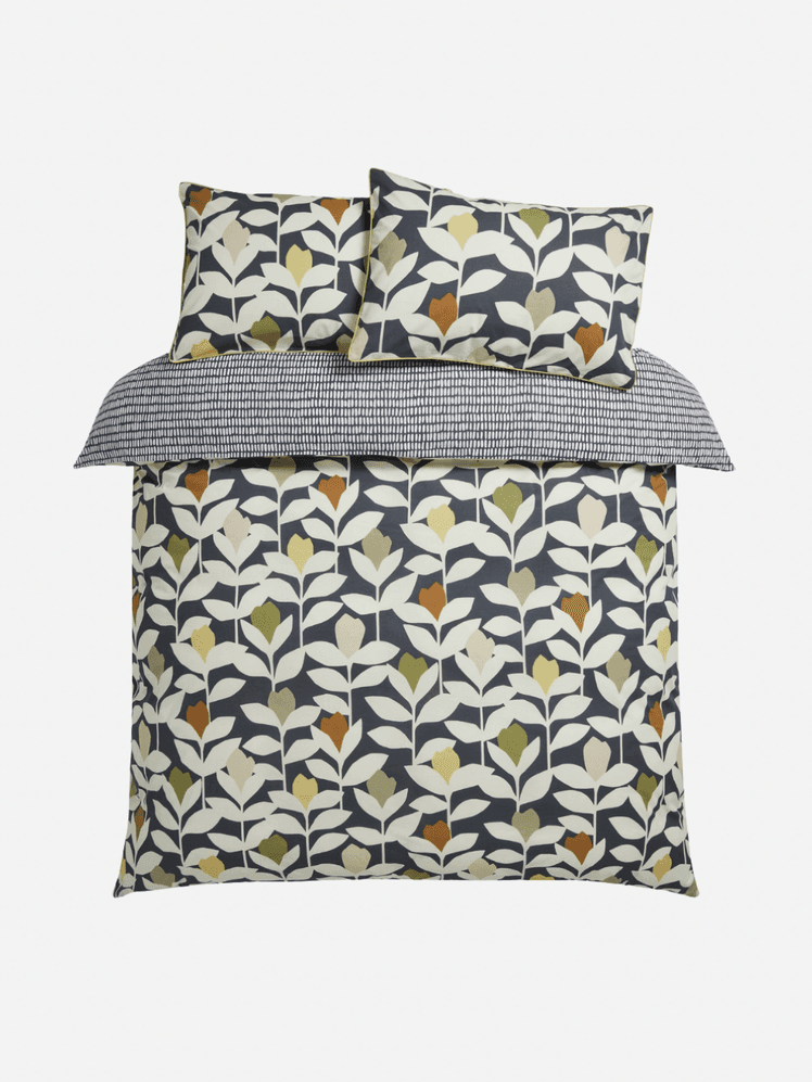 Image may contain: Cushion, Home Decor, Pillow, Furniture, Bed, Bed Sheet, Accessories, Bag, and Handbag