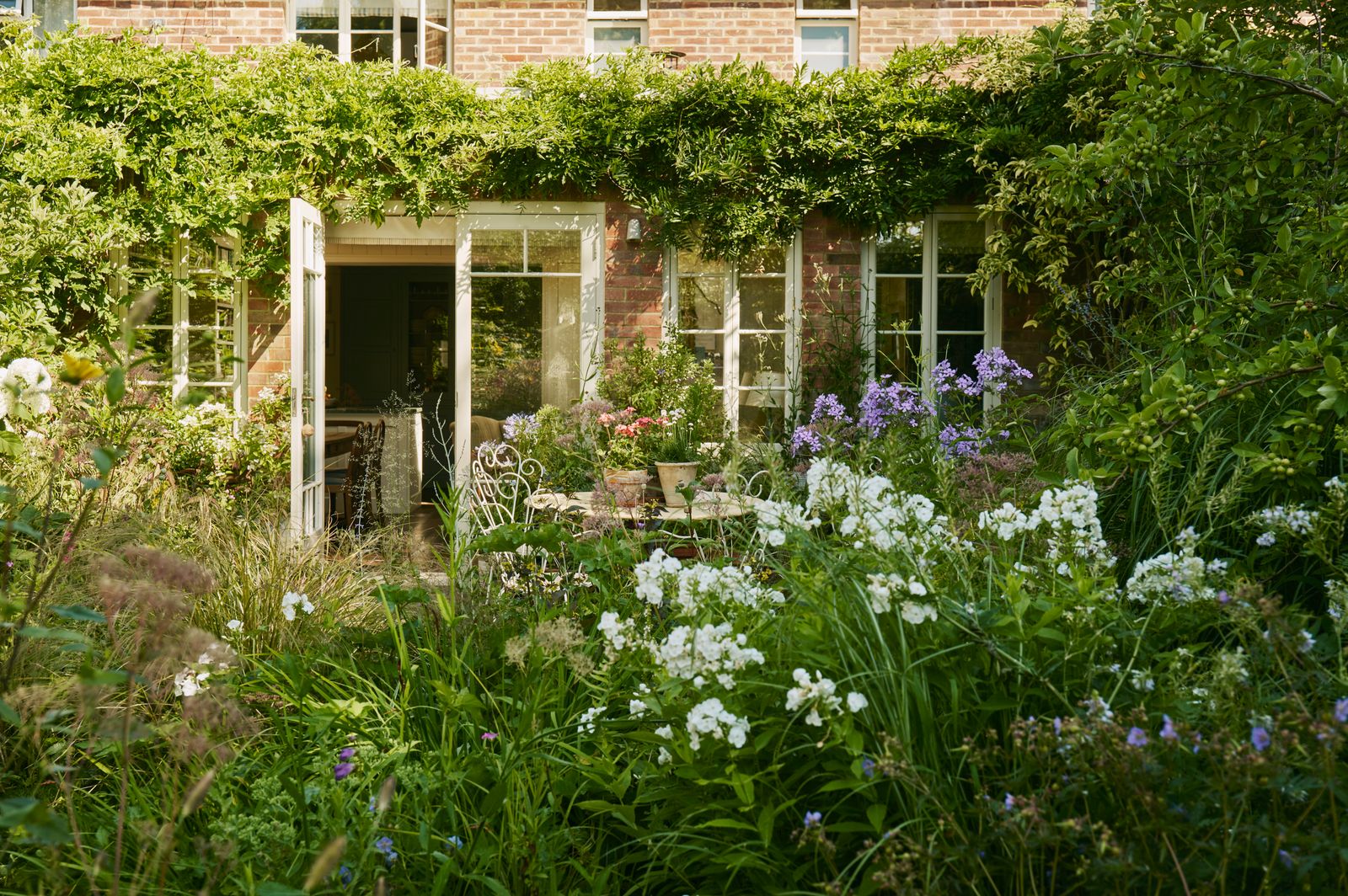 Image may contain Architecture Building Cottage House Housing Garden Nature Outdoors Herbal Herbs and Plant