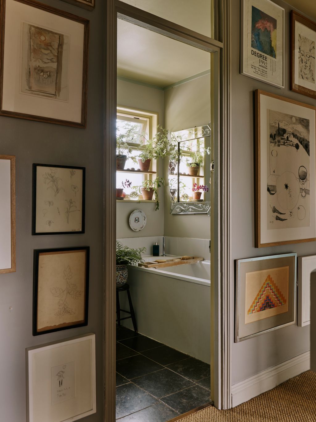 Image may contain Corner Indoors Interior Design Plant Art Painting Bathing Tub Bathtub Person and Floor