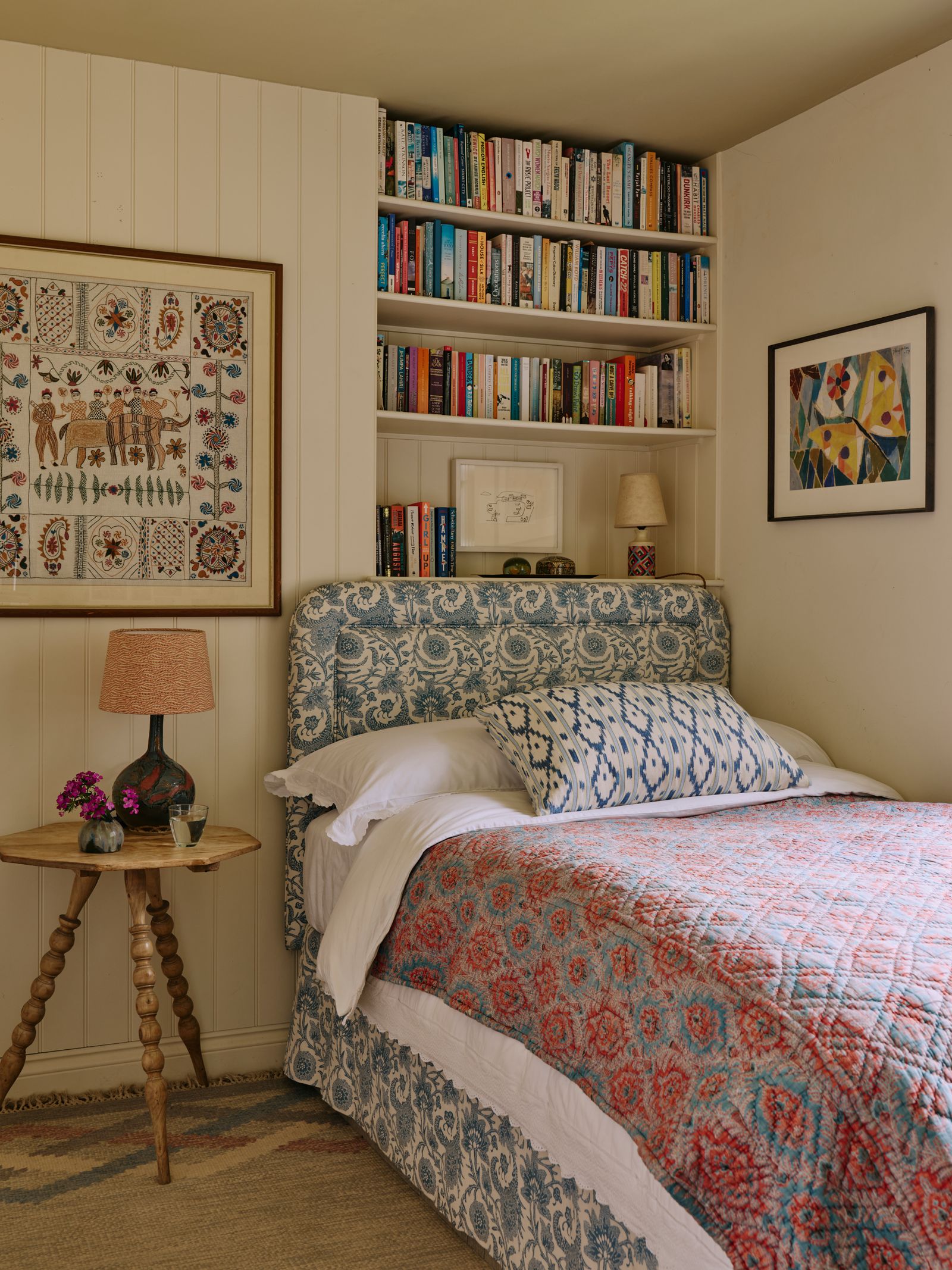 Image may contain Lamp Art Painting Desk Furniture Table Bed Cup Indoors Interior Design Home Decor and Bedroom