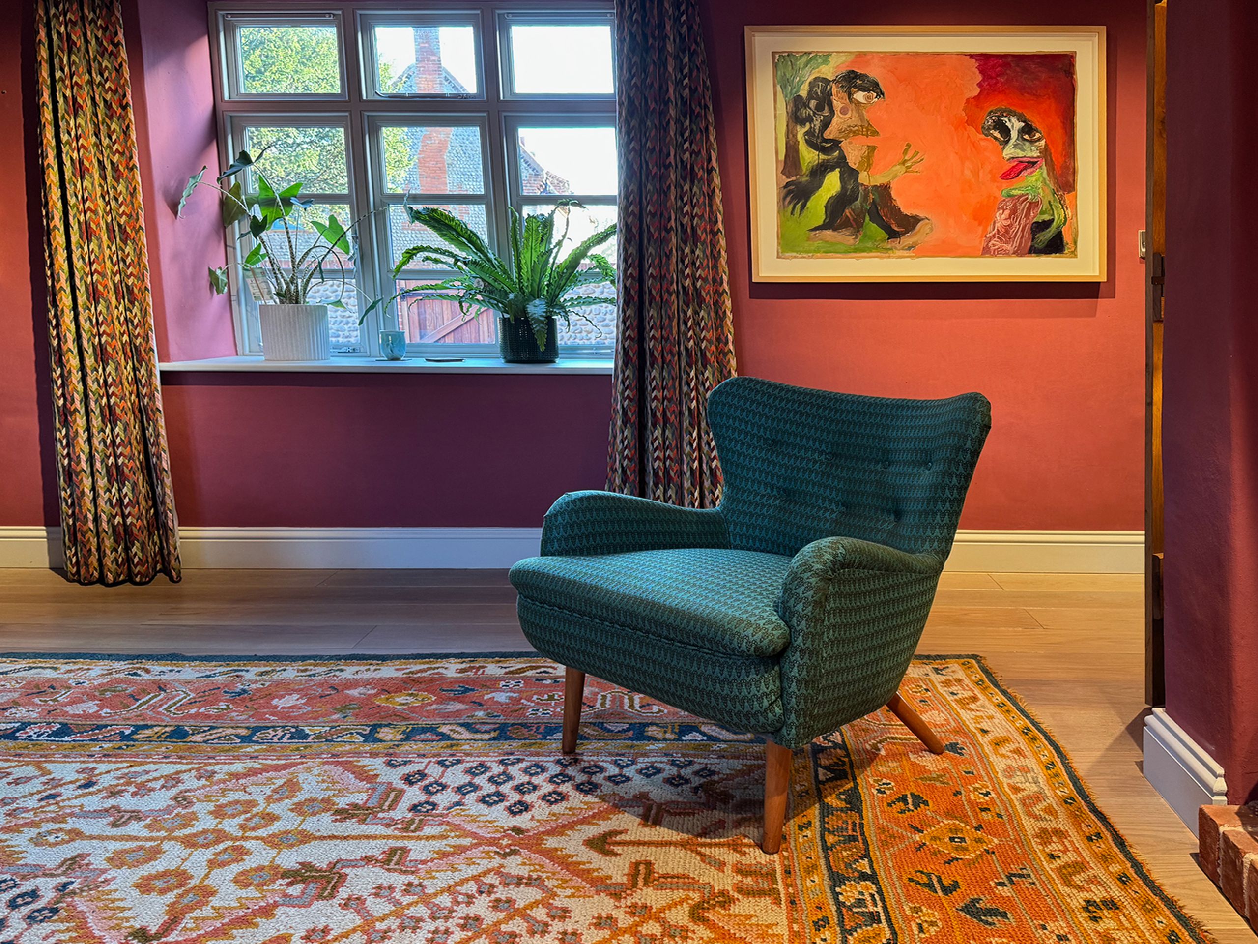 Image may contain: Chair, Furniture, Plant, Art, Painting, Home Decor, and Rug