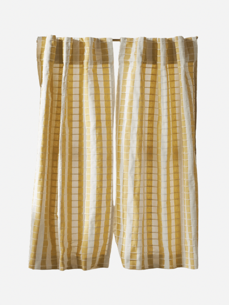 Image may contain Home Decor Linen Curtain Clothing and Shorts