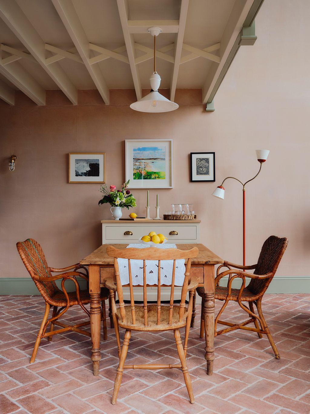 Image may contain Floor Architecture Building Dining Room Dining Table Furniture Indoors Room Table Lamp and Chair