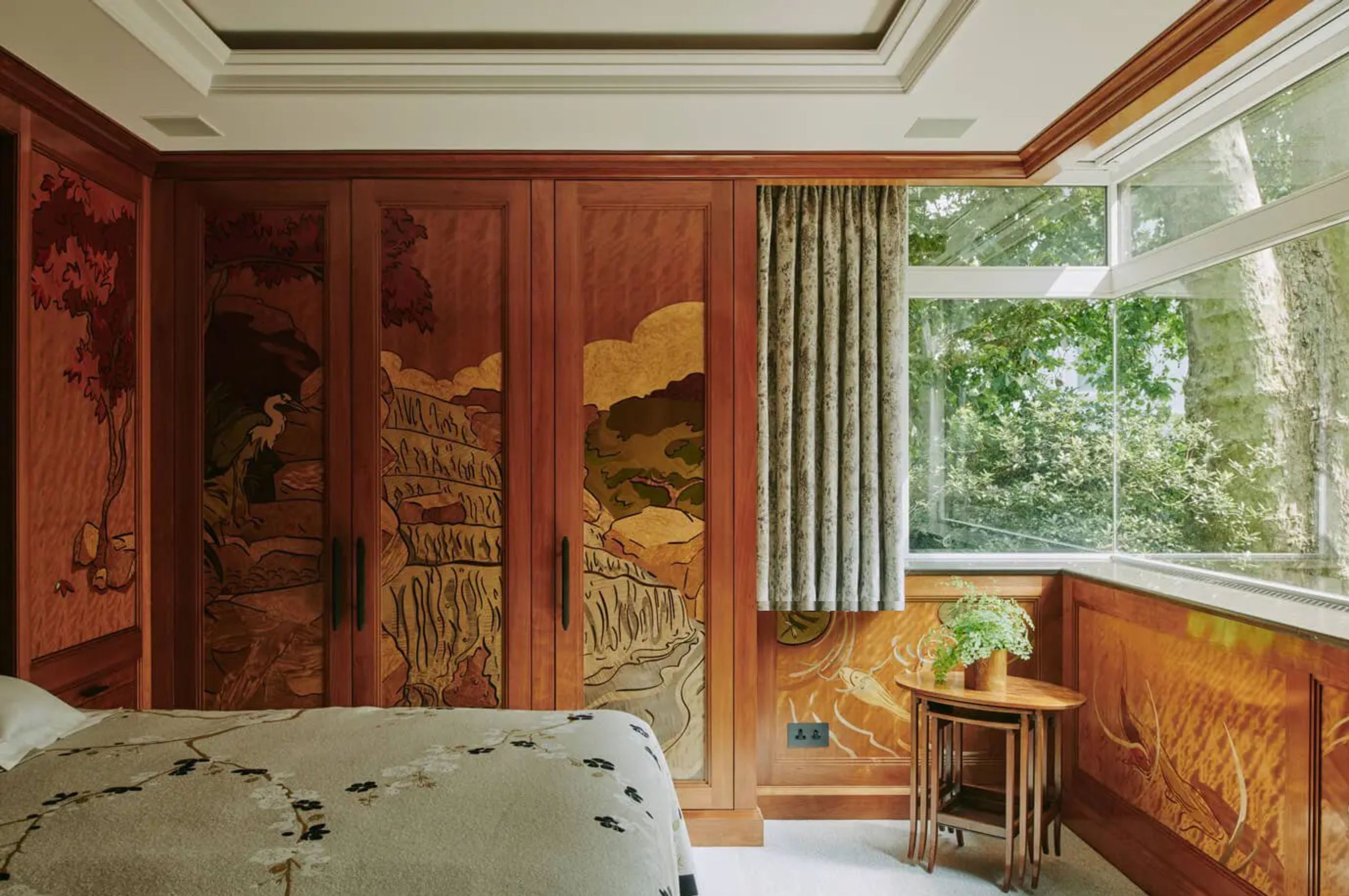 Image may contain: Indoors, Interior Design, Hardwood, Stained Wood, Wood, Plant, Wood Panels, Bed, Furniture, and Desk