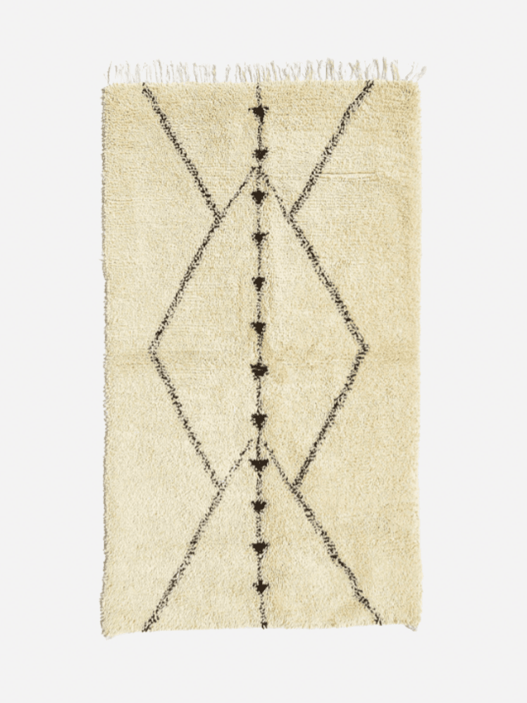 Image may contain: Home Decor, Rug, Accessories, Jewelry, and Necklace