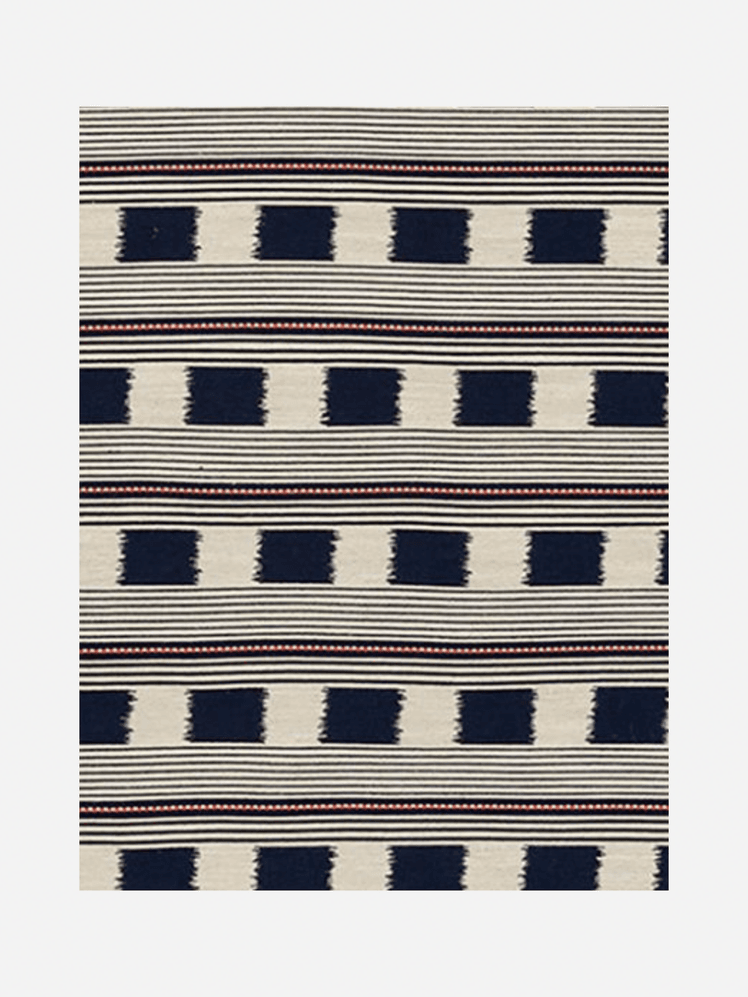 Image may contain: Home Decor, Rug, Architecture, and Building