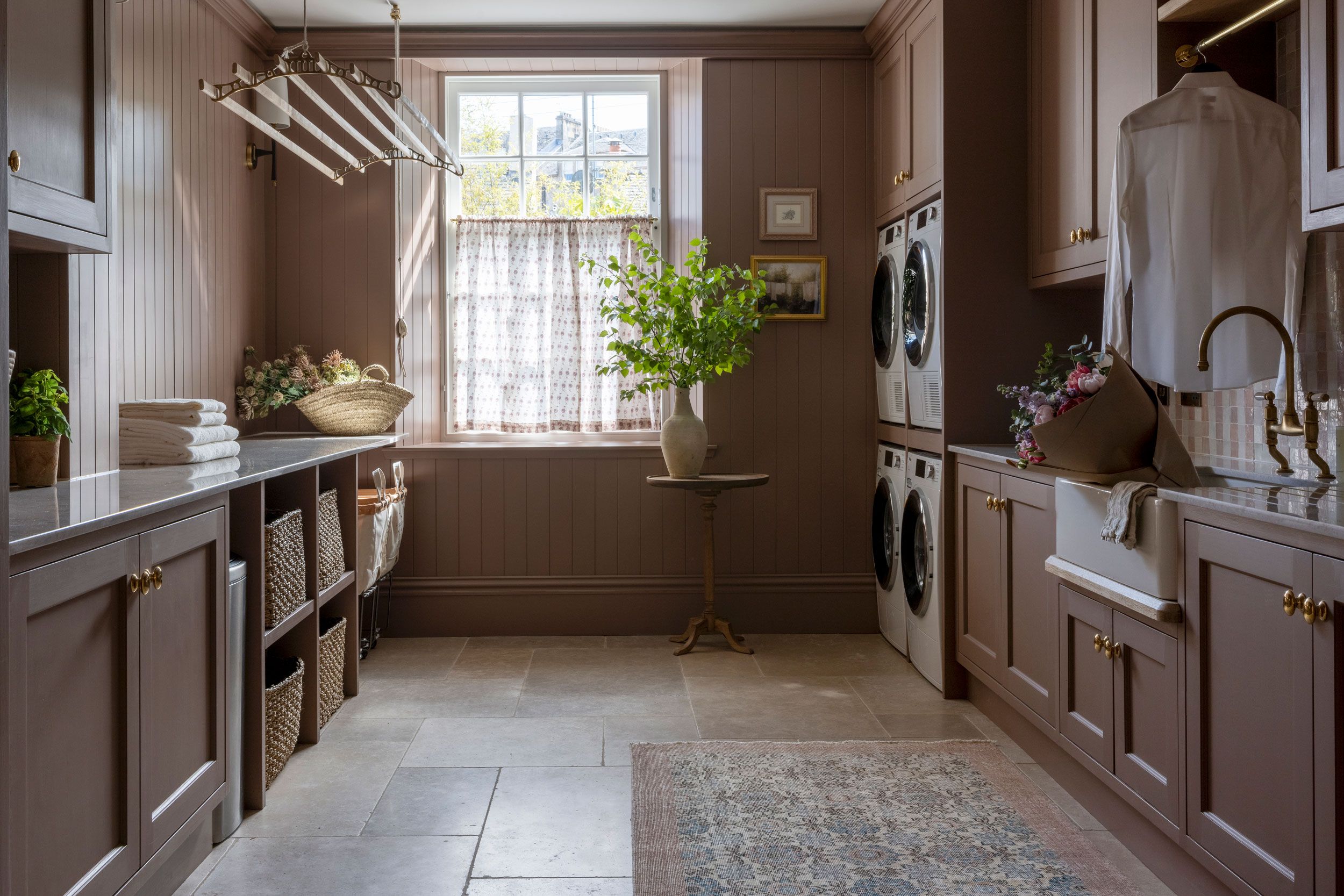 Image may contain: Floor, Indoors, Interior Design, Appliance, Device, Electrical Device, Washer, Home Decor, and Rug