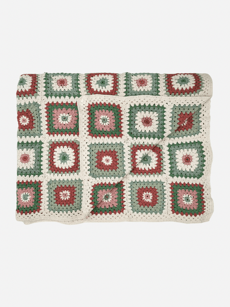 Image may contain: Cushion, Home Decor, Pillow, Rug, Clothing, and Shorts