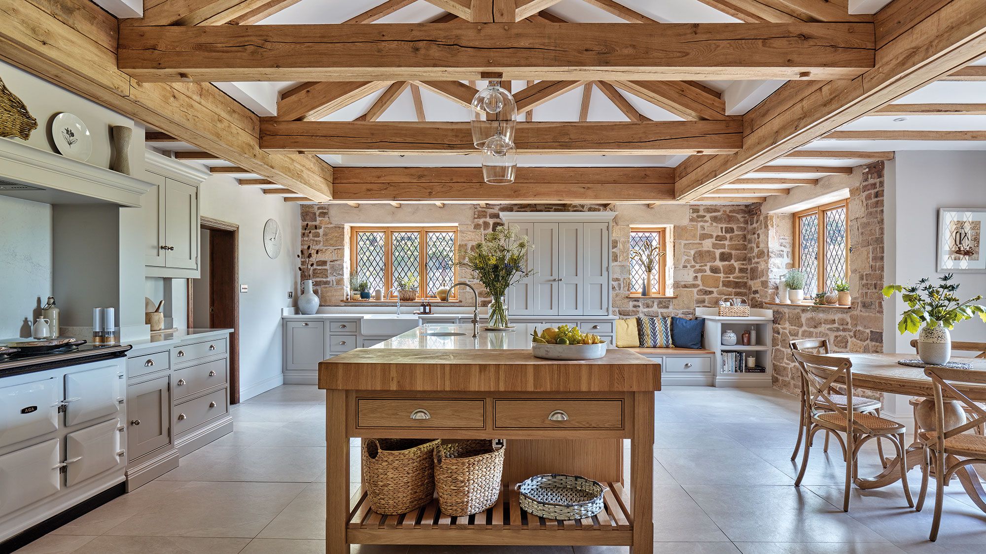 Image may contain: Indoors, Interior Design, Kitchen, Wood, Chair, Furniture, and Kitchen Island