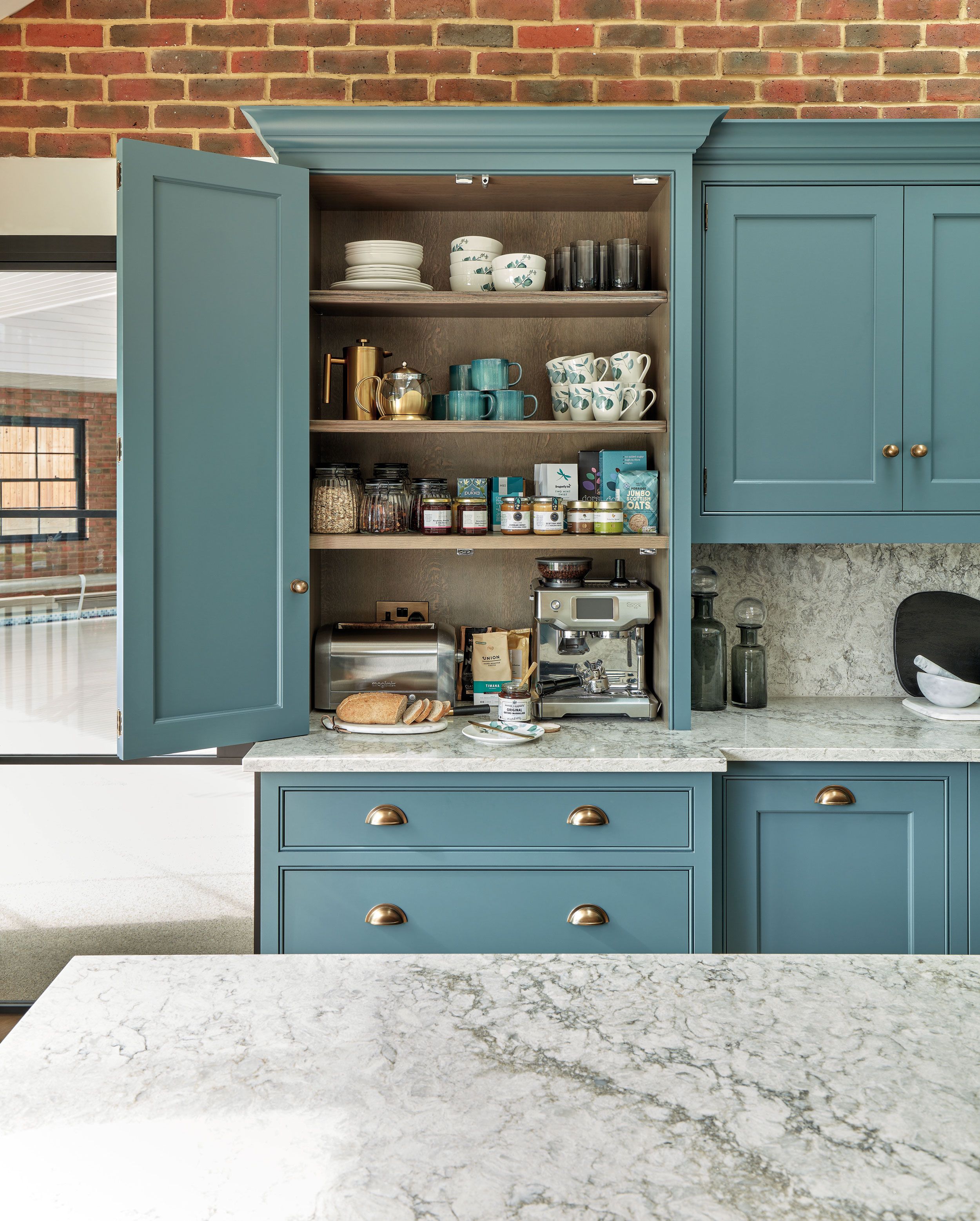 Image may contain: Closet, Cupboard, Furniture, Shelf, Indoors, Interior Design, Cabinet, Cup, Appliance, and Device