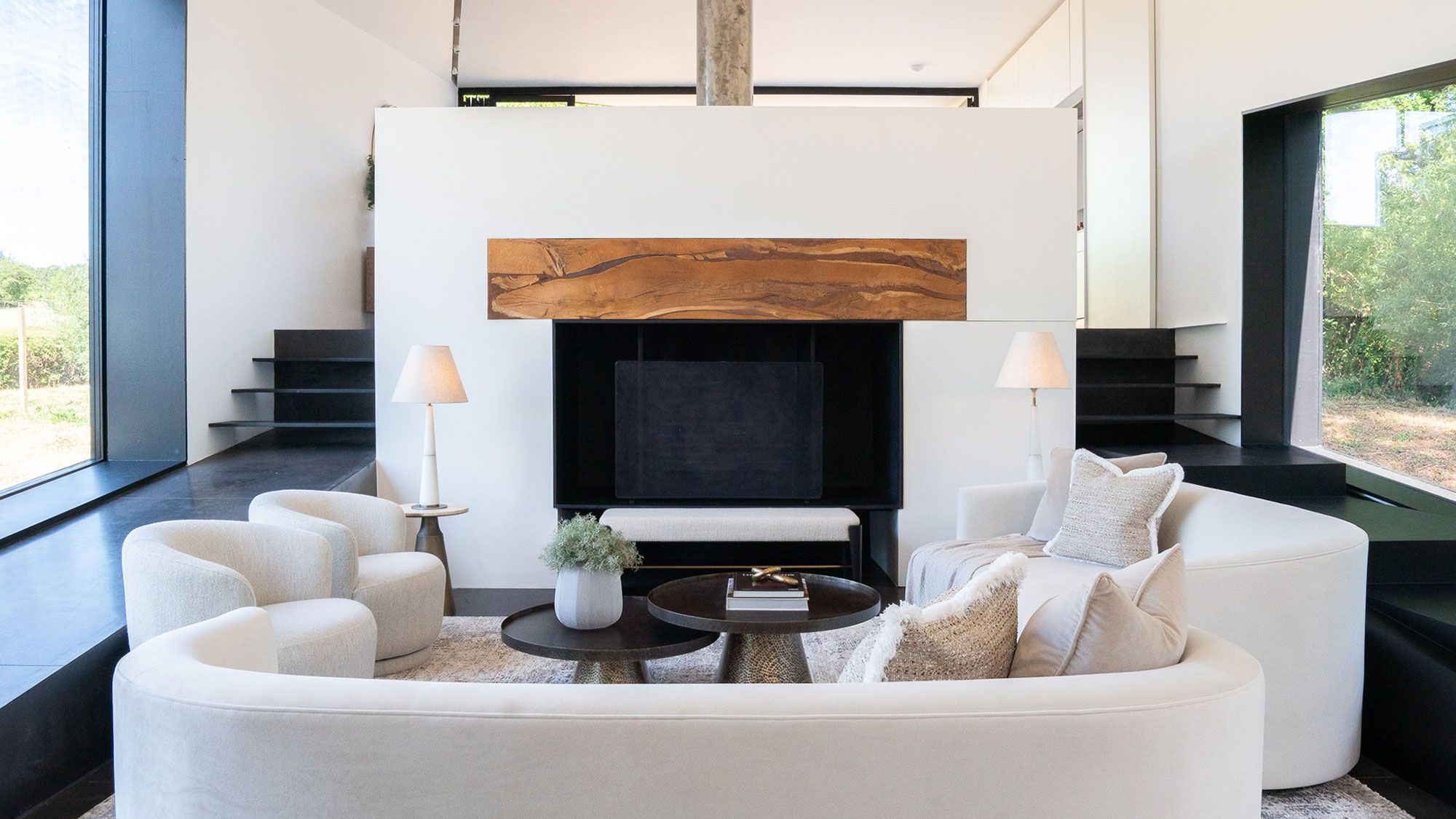 Image may contain: Home Decor, Architecture, Building, Furniture, Indoors, Living Room, Room, Table, and Interior Design