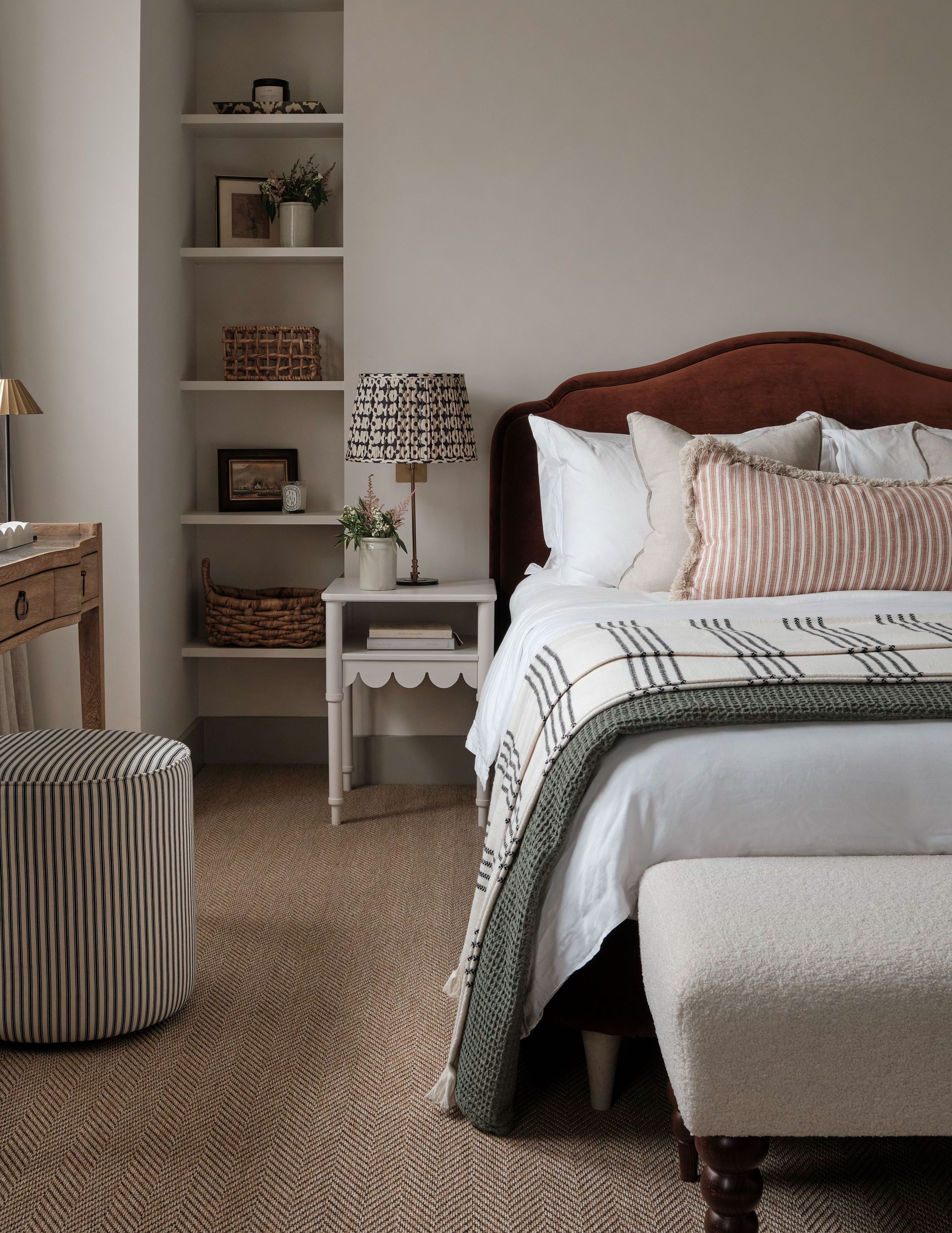 Image may contain: Lamp, Home Decor, Furniture, Bed, Art, Painting, Plant, Cushion, Pillow, Accessories, Bag, and Handbag