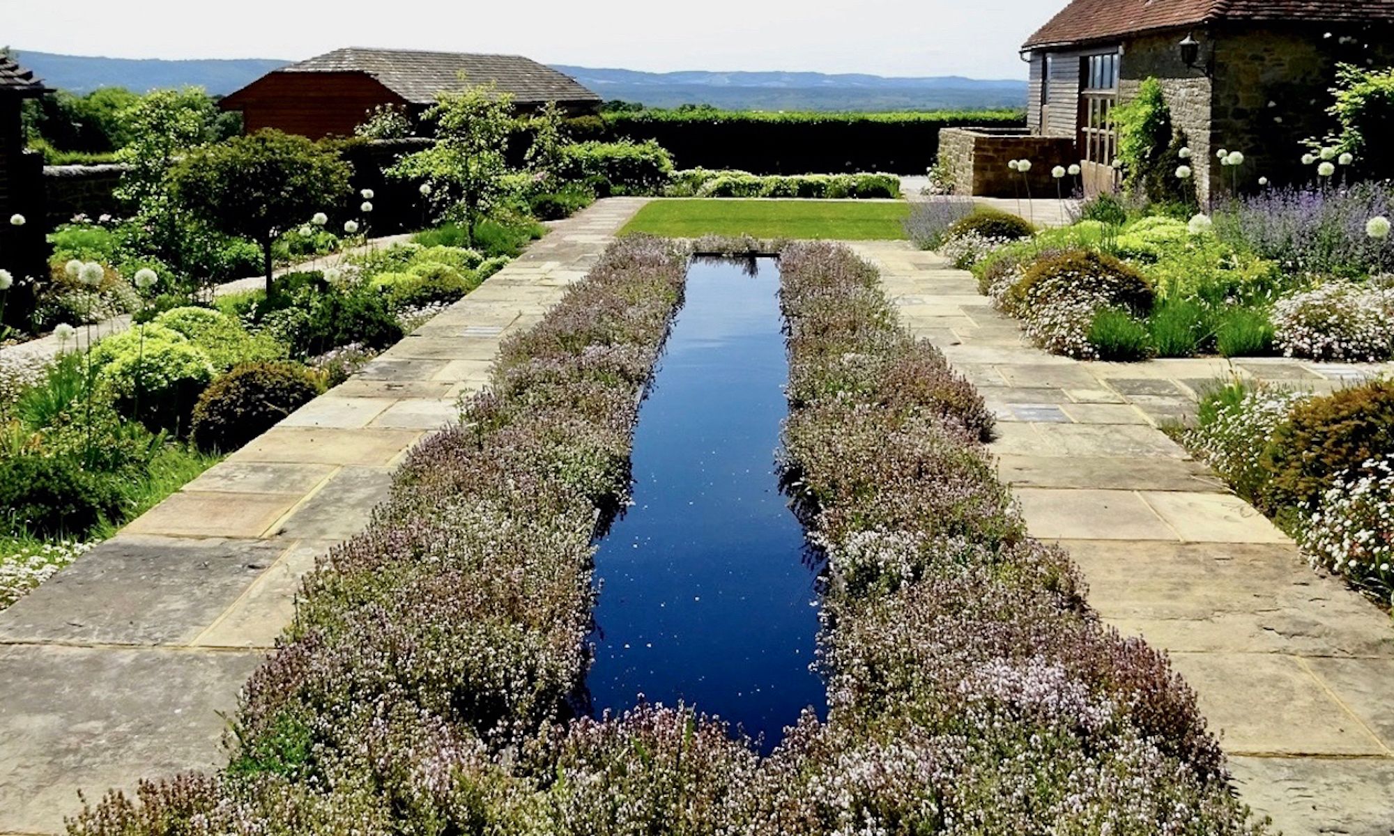 Image may contain: Outdoors, Garden, Nature, Backyard, Yard, Grass, Plant, Pond, Water, Ditch, Path, and Architecture