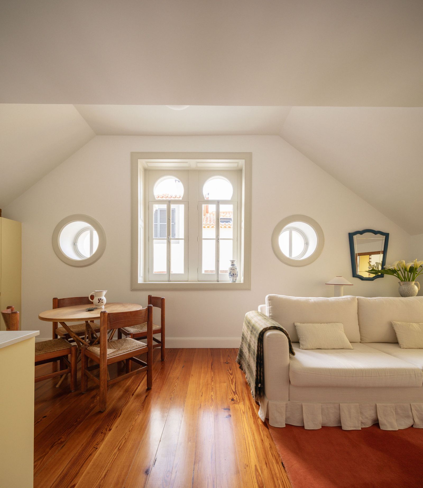 Image may contain Hardwood Wood Couch Furniture Architecture Building House Housing Indoors Loft Room and Floor