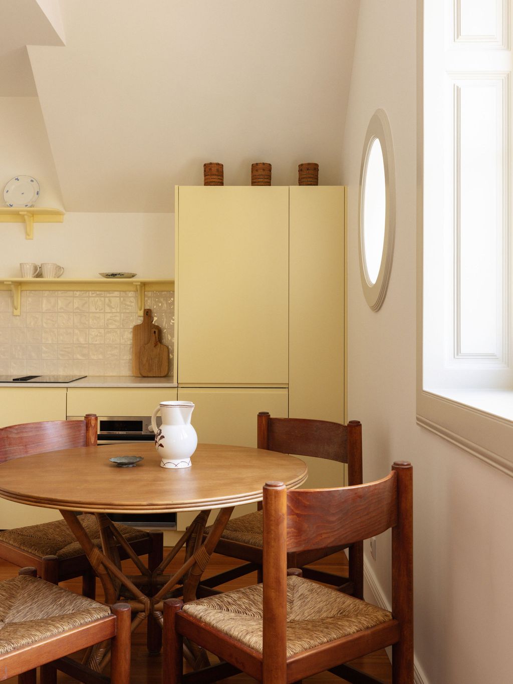 Image may contain Architecture Building Dining Room Dining Table Furniture Indoors Room Table and Chair