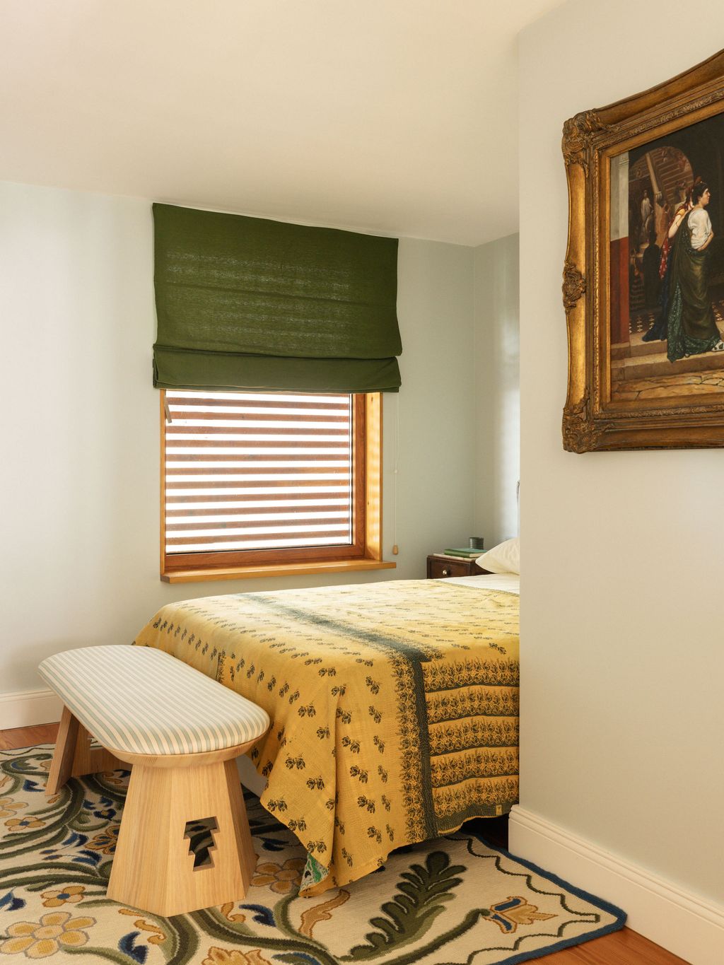 Image may contain Home Decor Rug Indoors Interior Design Art Painting Corner Bed Furniture Bench and Person