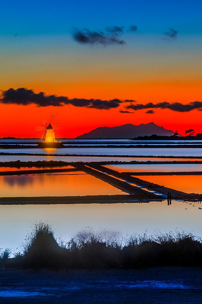 Image may contain Water Waterfront Nature Outdoors Sky Sunset Boat Sailboat Transportation Vehicle and Pier