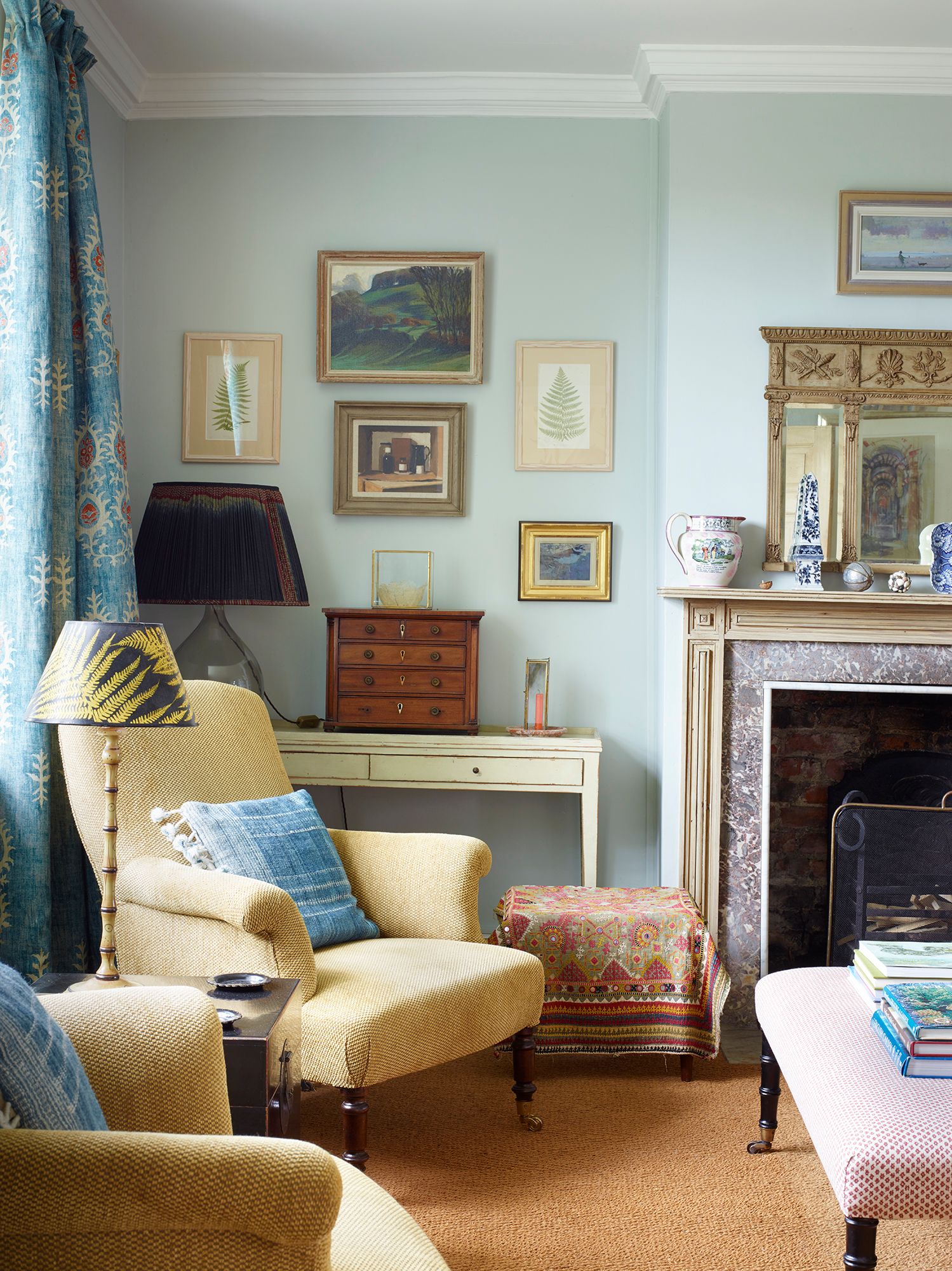 Image may contain Lamp Architecture Building Furniture Indoors Living Room Room Art Painting Home Decor and Couch