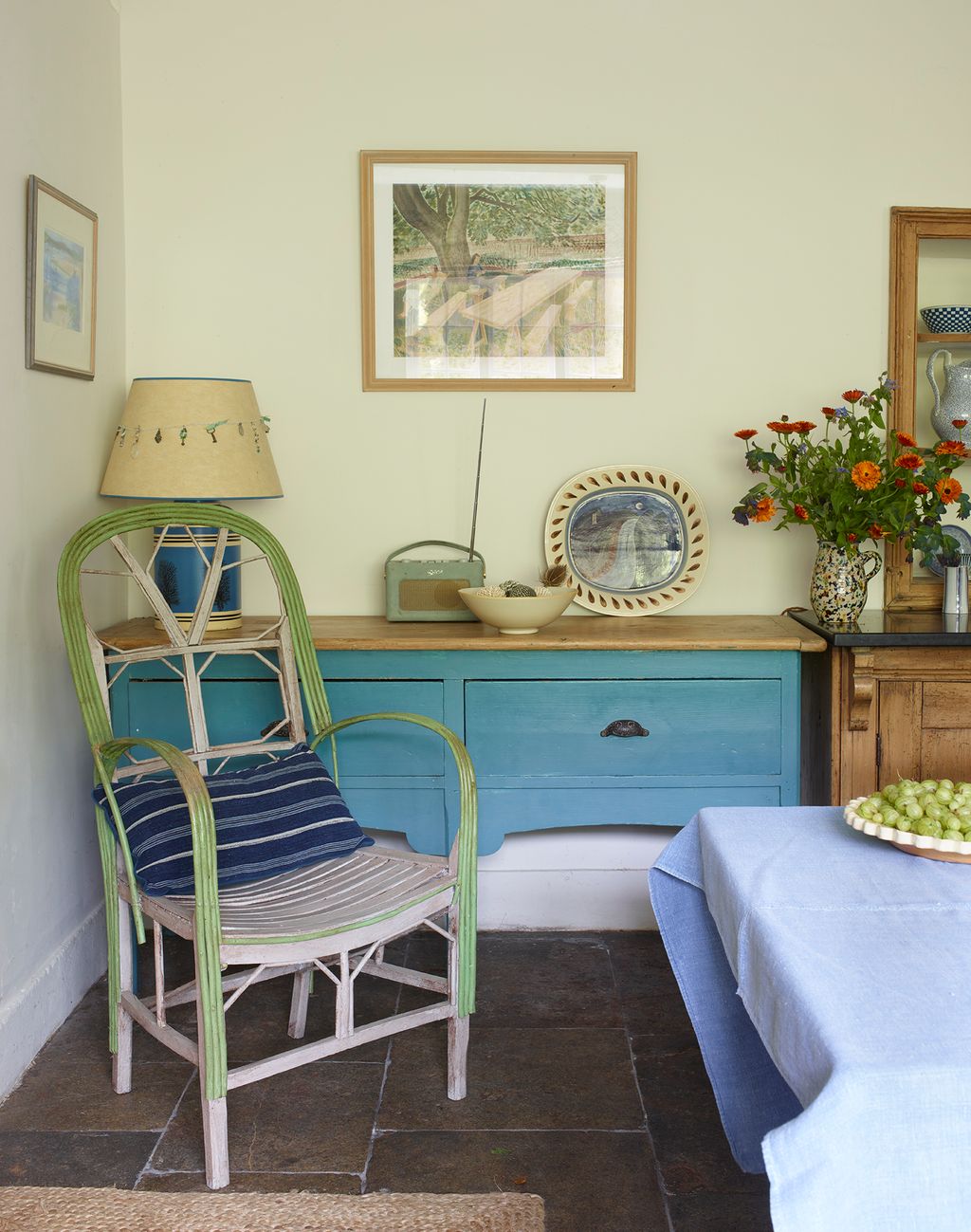 Image may contain Art Painting Chair Furniture Architecture Building Dining Room Dining Table Indoors and Room