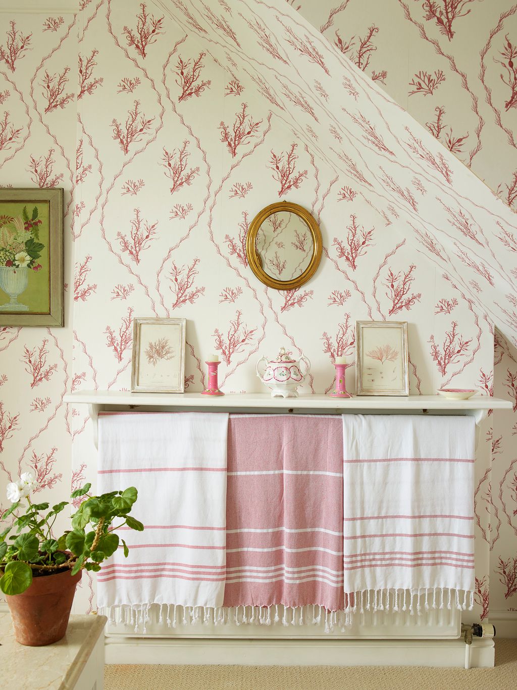 Image may contain Indoors Interior Design Art Painting Plant Potted Plant Pottery Home Decor and Architecture