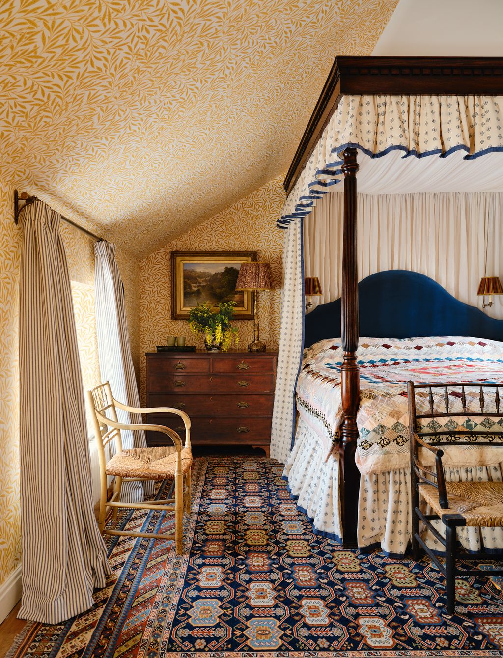 Image may contain Furniture Indoors Bed Bedroom Room Lamp Chair Art Painting Plant Home Decor Rug and Canopy Bed