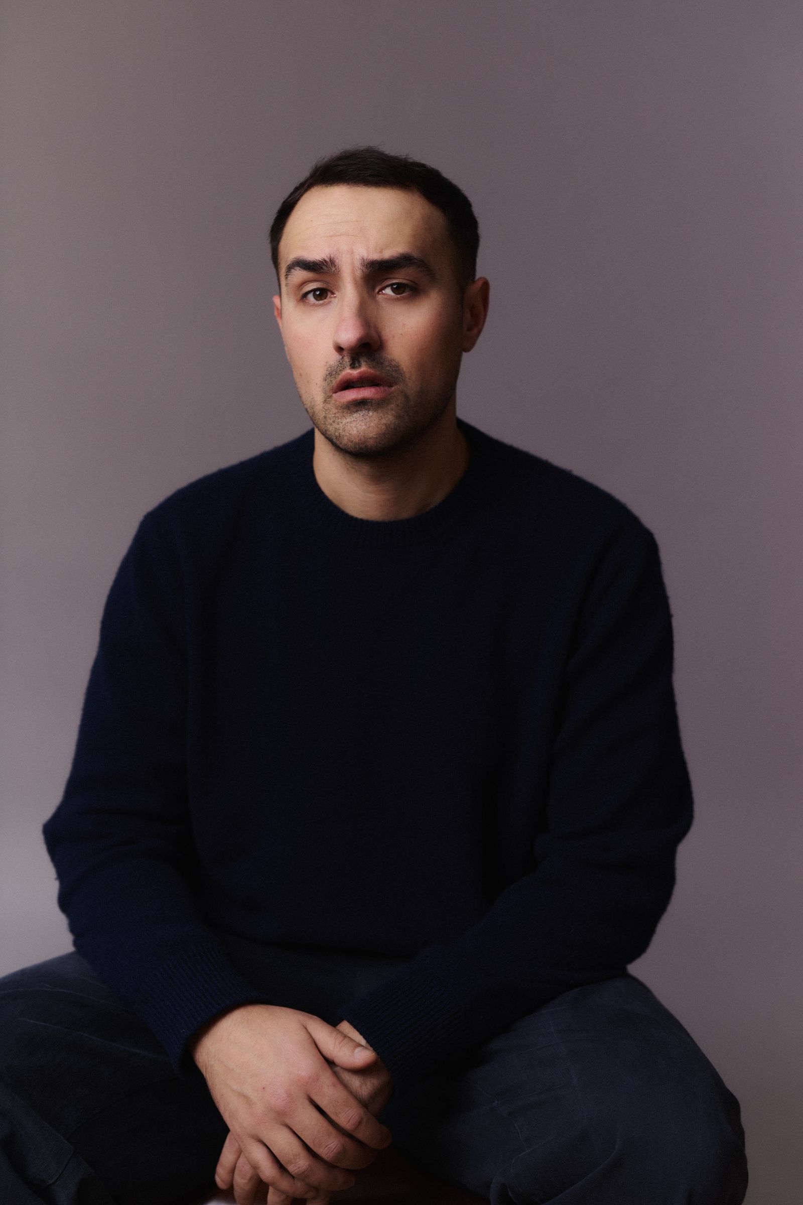 Image may contain Face Head Person Photography Portrait Adult and Sitting