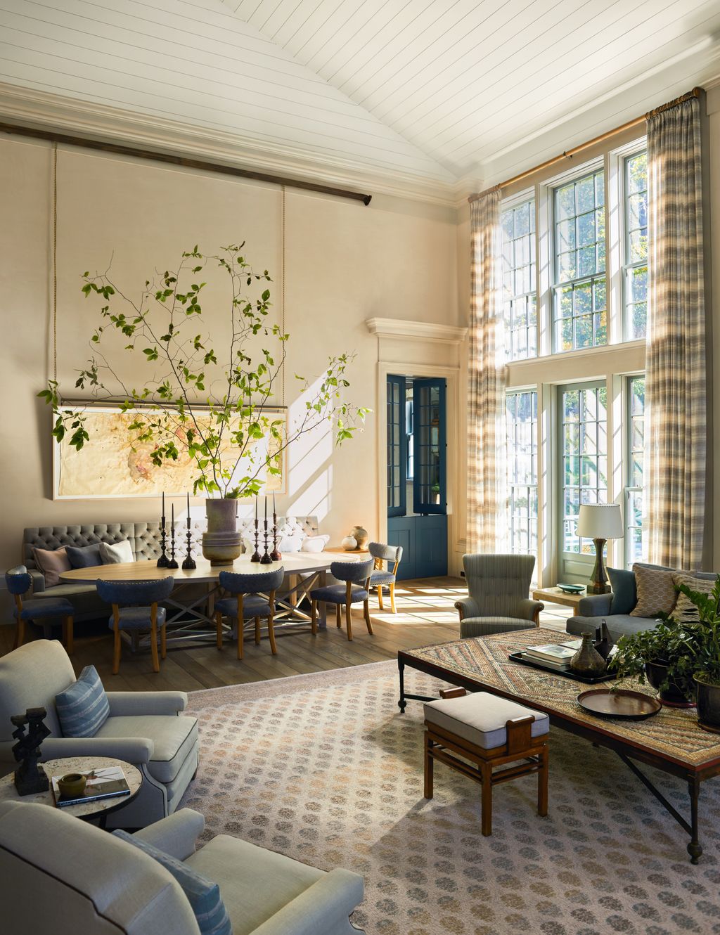 Image may contain Home Decor Coffee Table Furniture Table Lamp Chair Couch Architecture Building and Indoors