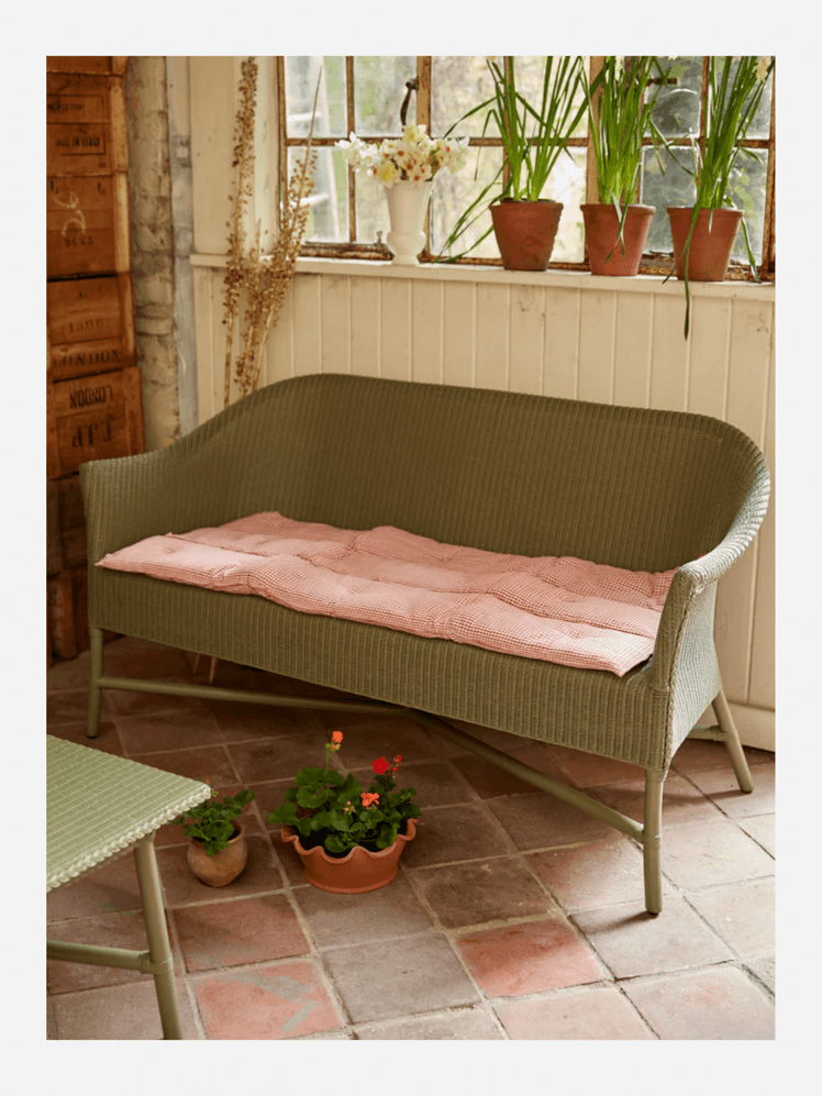 Image may contain: Couch, Furniture, Indoors, Interior Design, Plant, Potted Plant, Architecture, Building, and Living Room