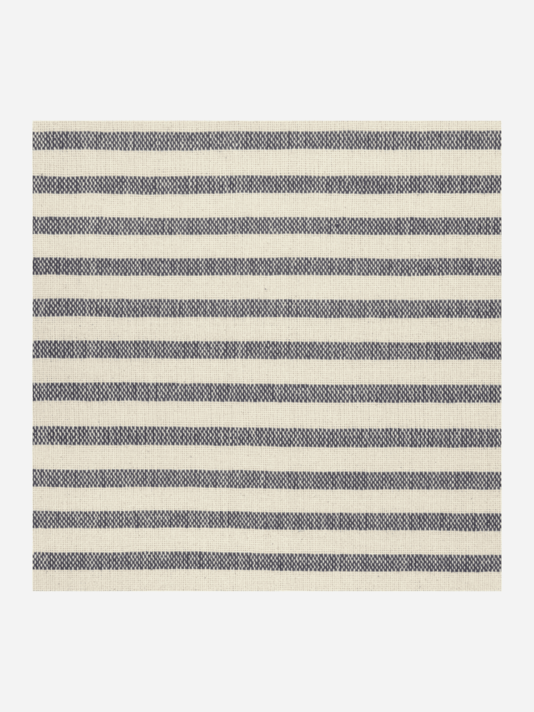 Image may contain: Home Decor, Rug, Architecture, and Building