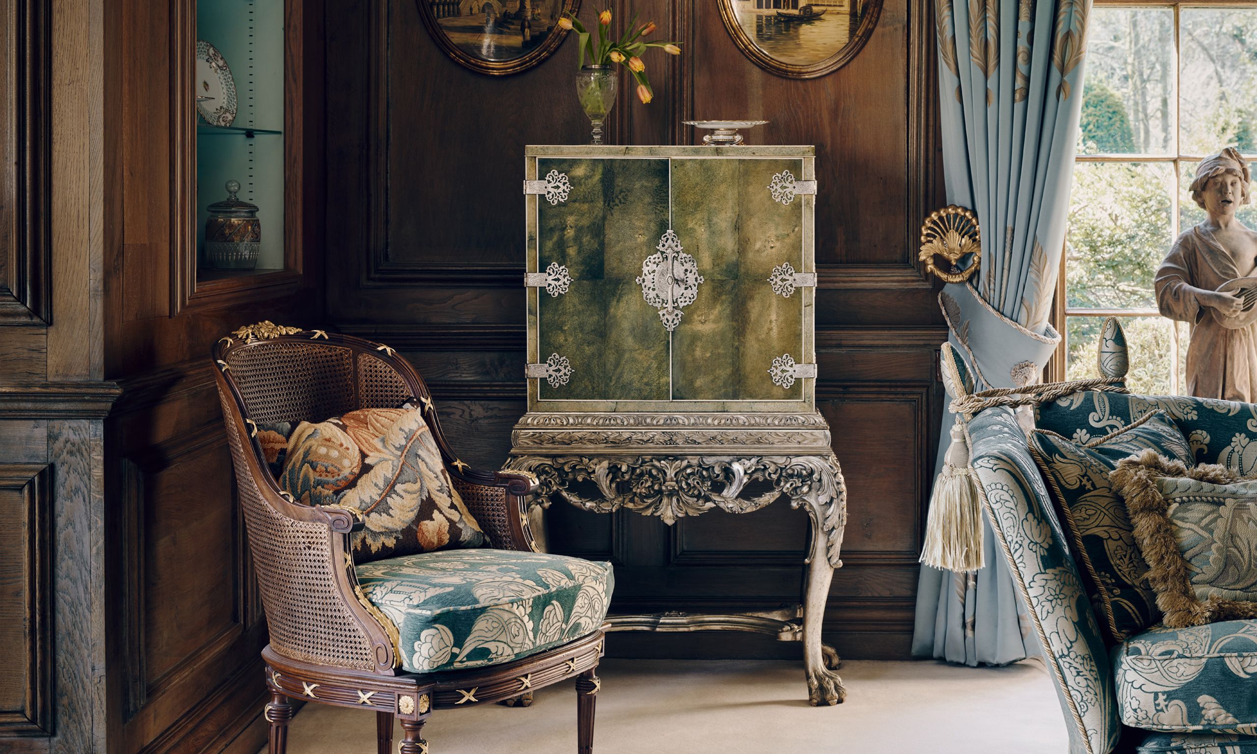 Image may contain: Chair, Furniture, Home Decor, Person, Indoors, Interior Design, Couch, Plate, Cushion, Desk, and Table