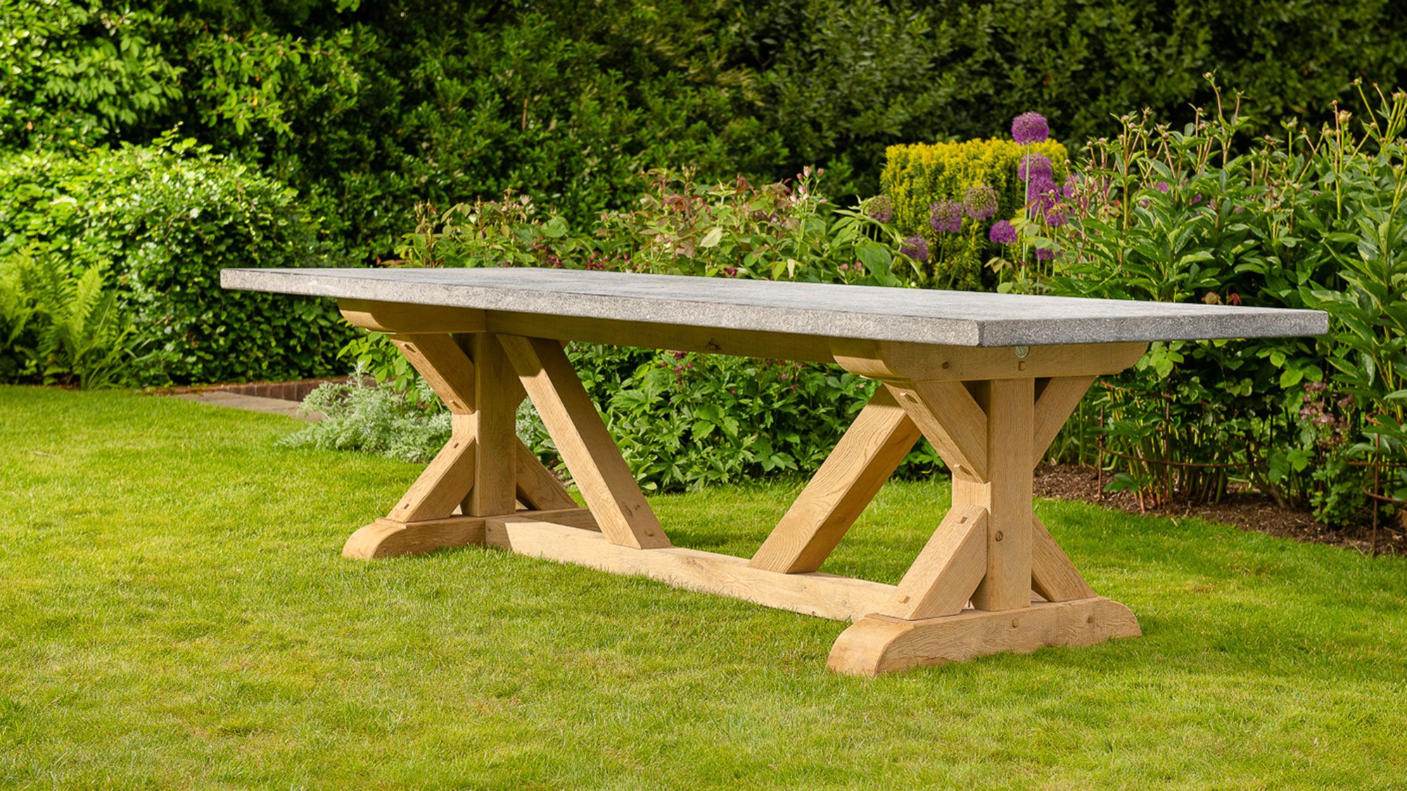 Image may contain: Bench, Furniture, Desk, Table, Wood, Hardwood, and Stained Wood