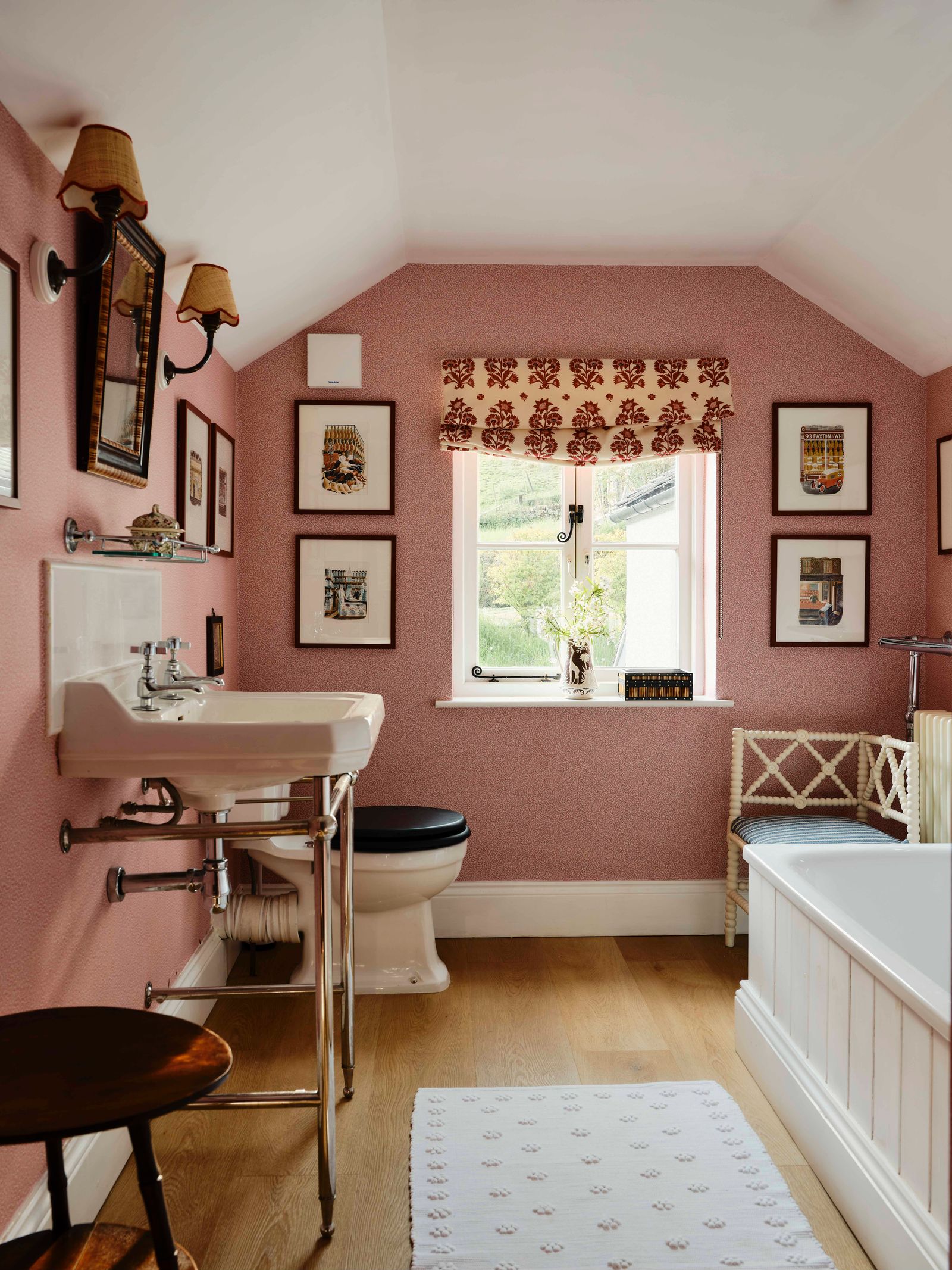 Image may contain Lamp Home Decor Rug Sink Art Painting Corner Bathroom Indoors Room Toilet and Sink Faucet