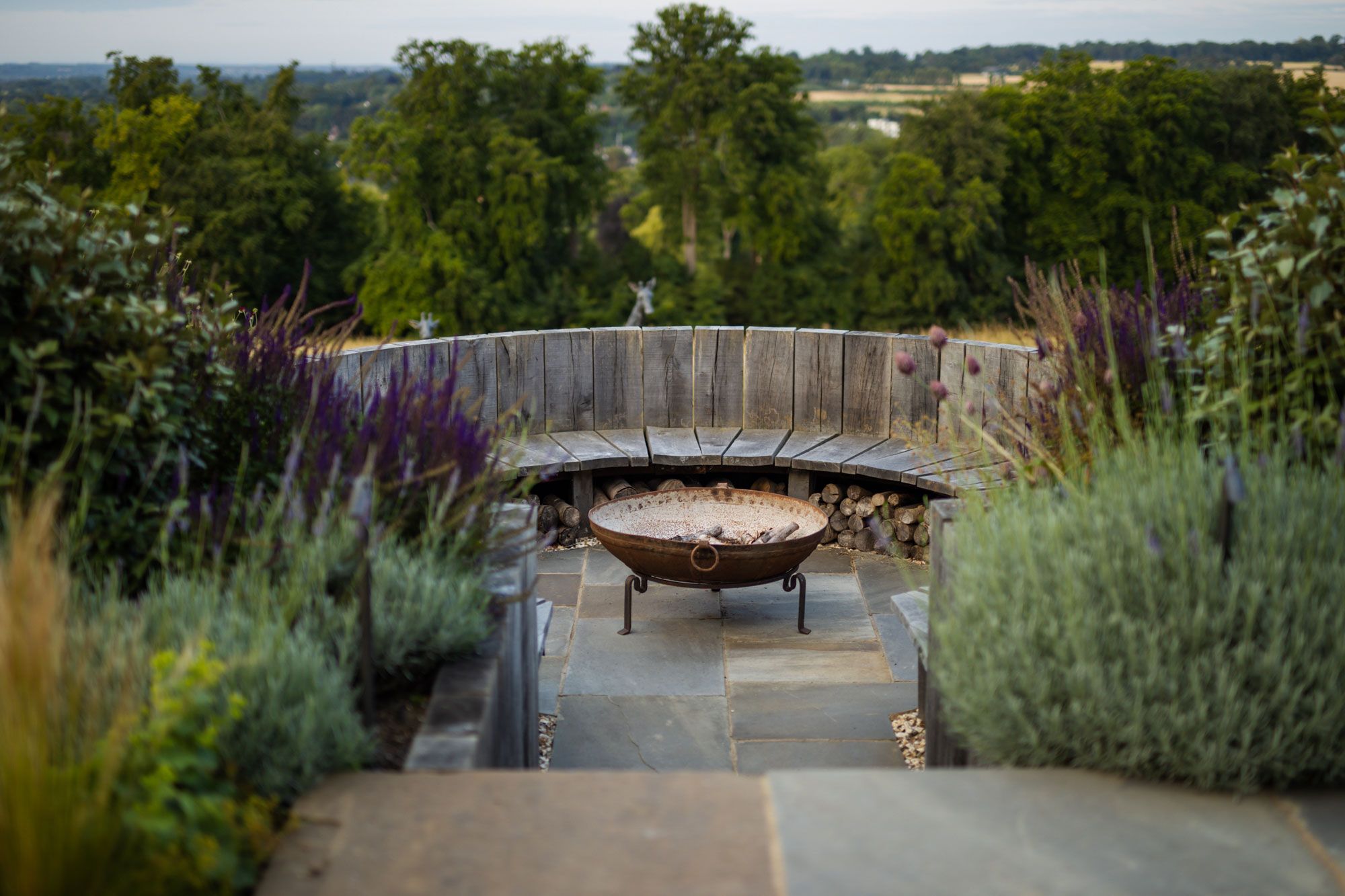 Image may contain: Backyard, Nature, Outdoors, Yard, Garden, Plant, Vegetation, Path, Walkway, Tub, Potted Plant, and Grass