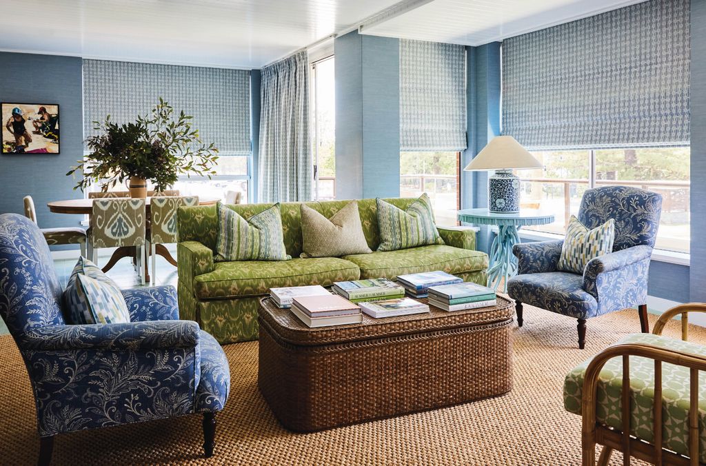 Image may contain Home Decor Lamp Couch Furniture Chair Table Coffee Table Architecture Building and Indoors