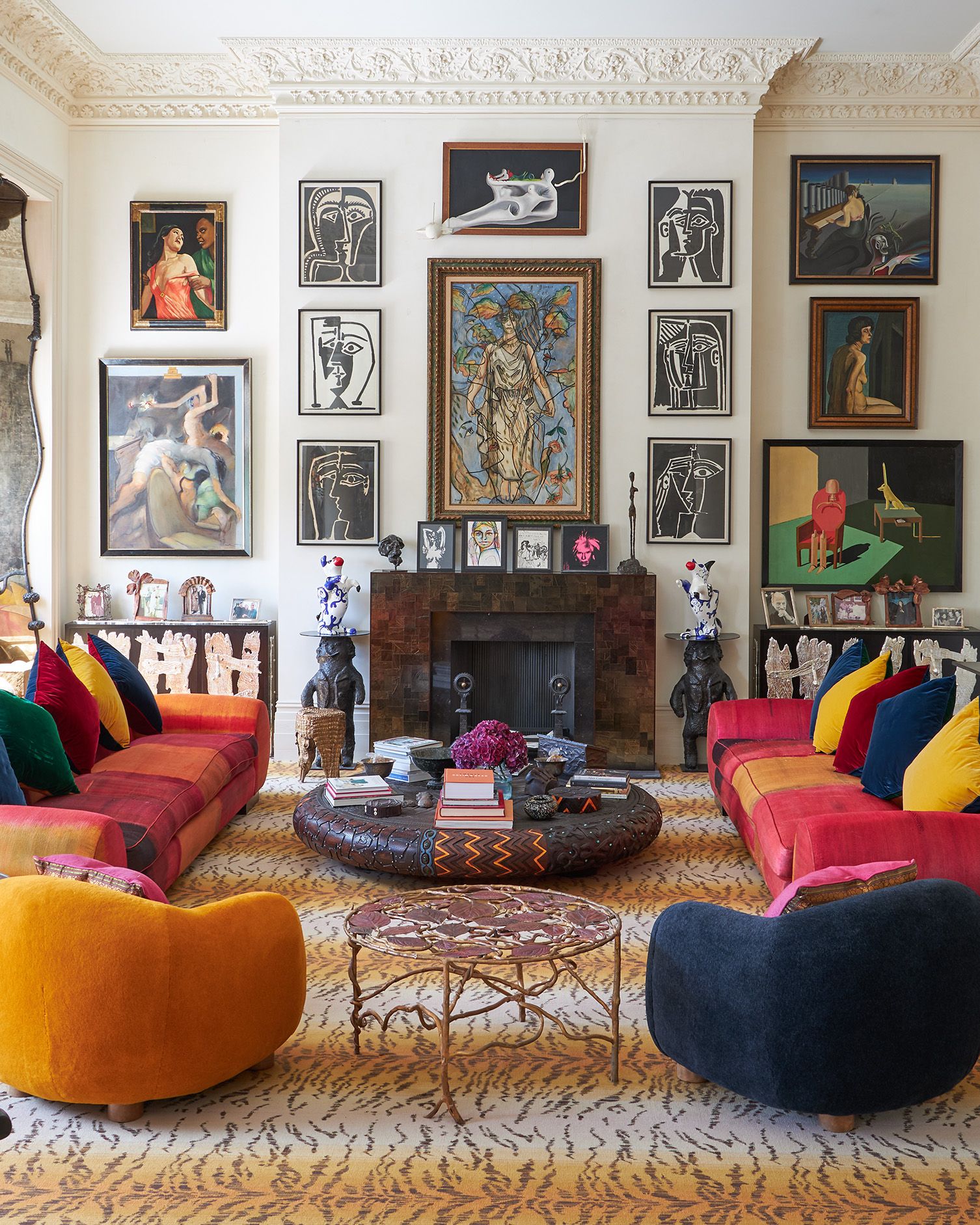 Image may contain Home Decor Art Painting Couch Furniture Book Publication Rug Person Architecture and Building