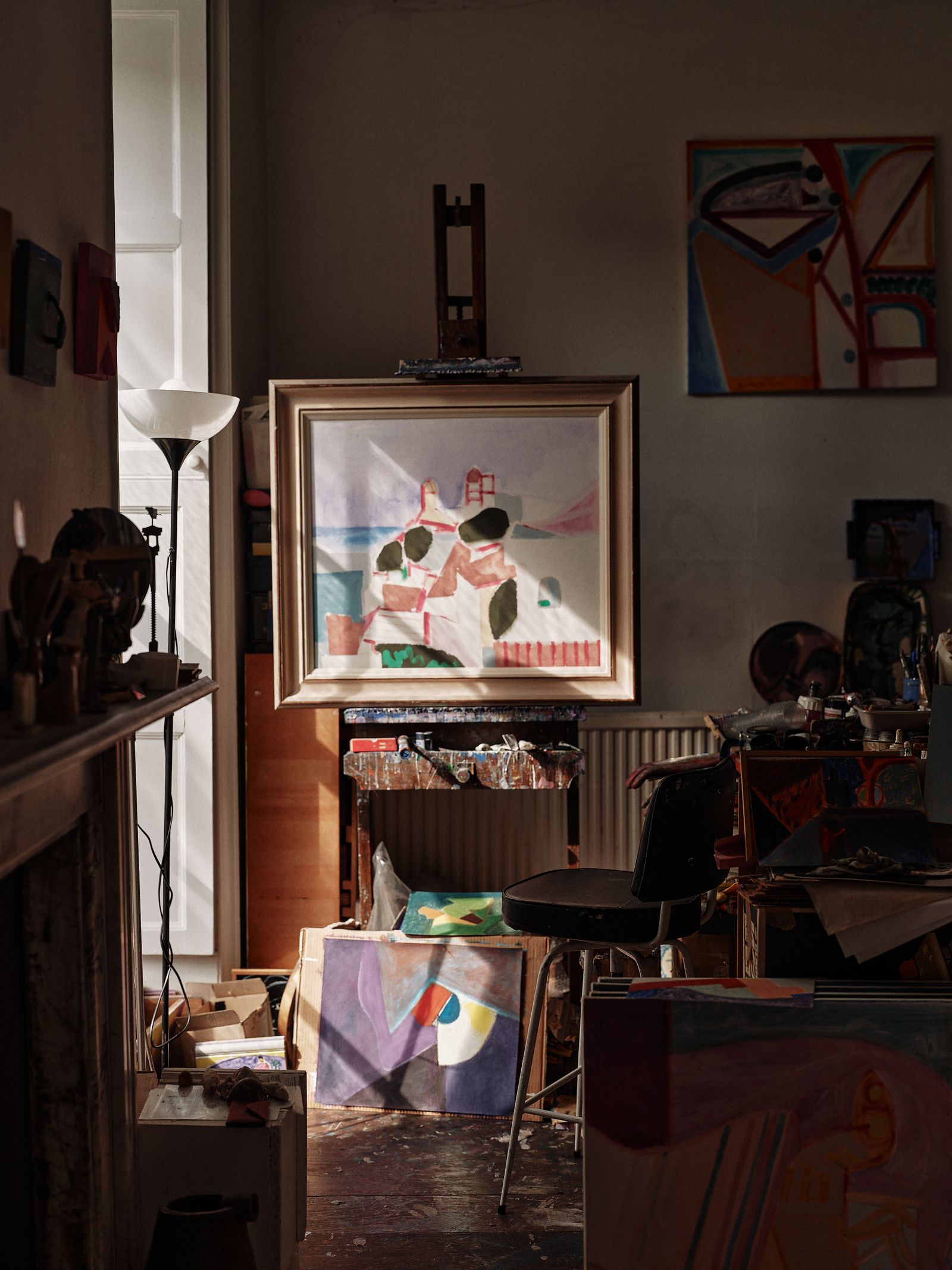 Image may contain Architecture Building Furniture Indoors Living Room Room Art Painting Interior Design and Lamp