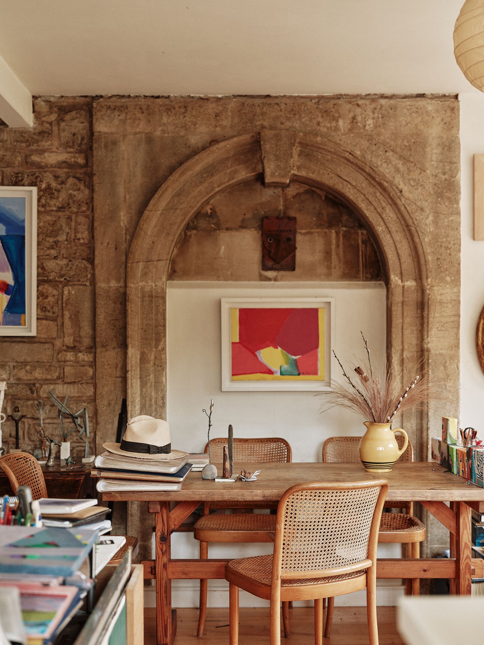 Image may contain Indoors Interior Design Architecture Building Dining Room Dining Table Furniture Room and Table