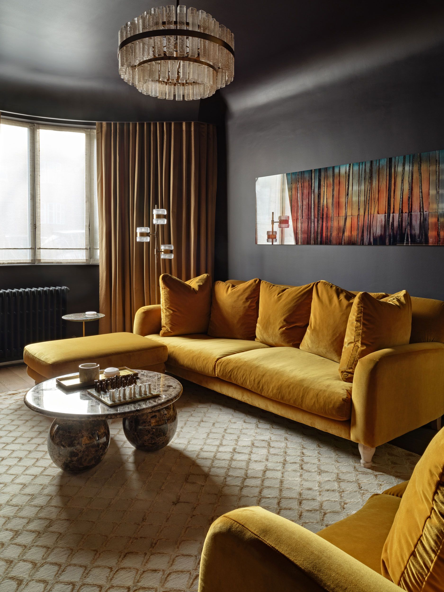 Image may contain: Home Decor, Lamp, Architecture, Building, Furniture, Indoors, Living Room, Room, and Couch