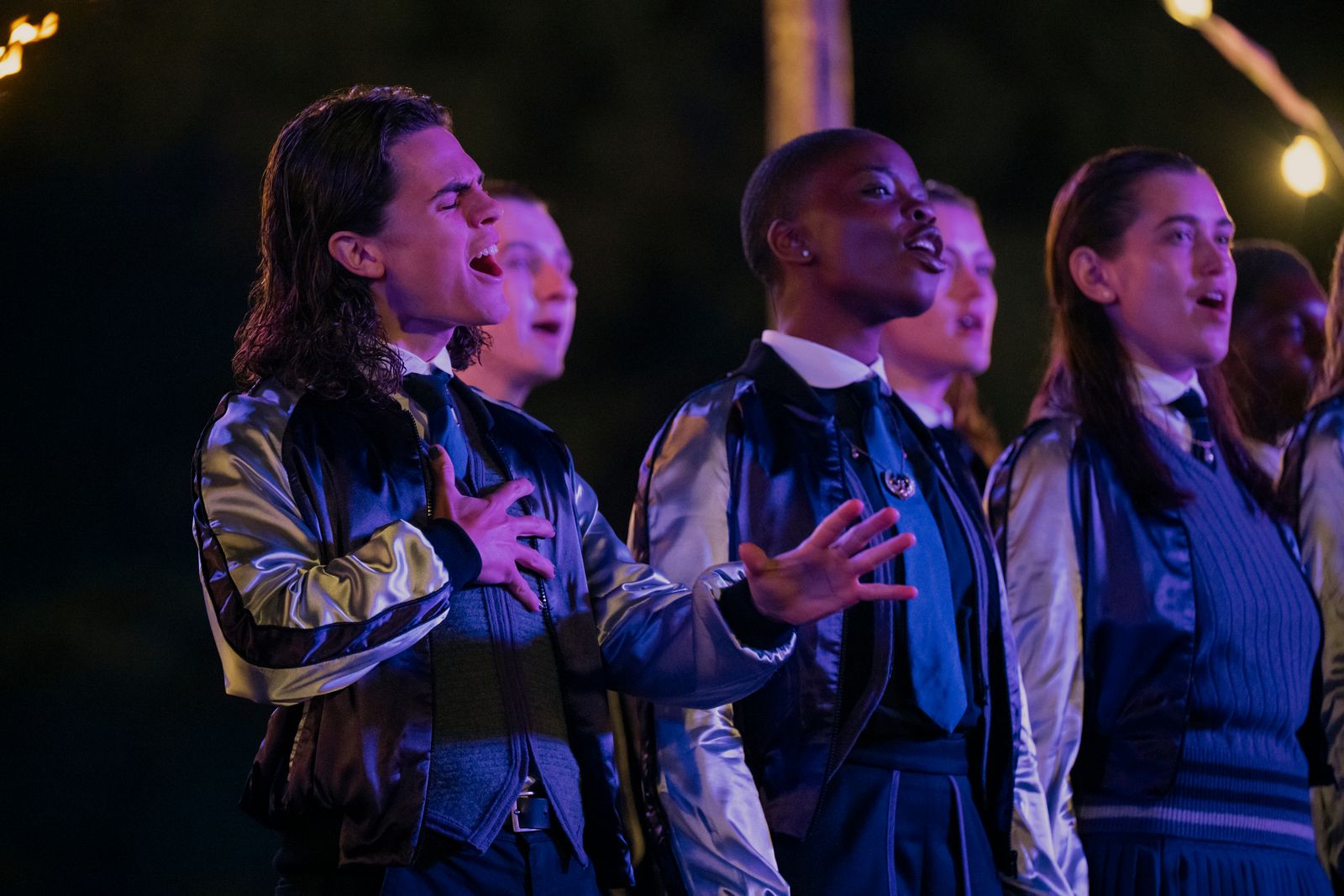 Image may contain Person Adult Teen Accessories Formal Wear Tie Head Face and Group Performance