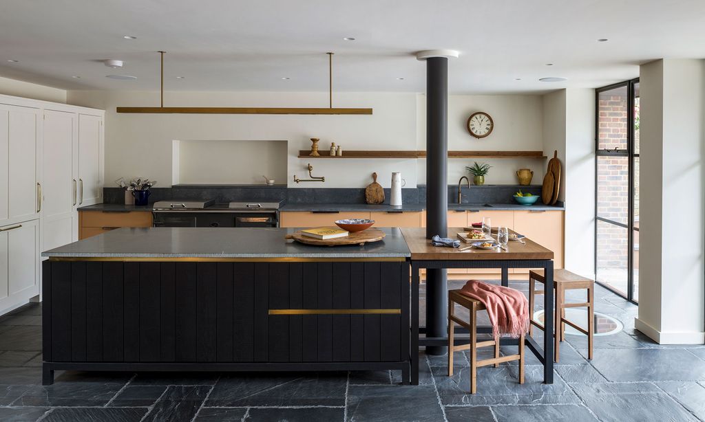 Image may contain Indoors Interior Design Kitchen Kitchen Island Plant Sink and Sink Faucet