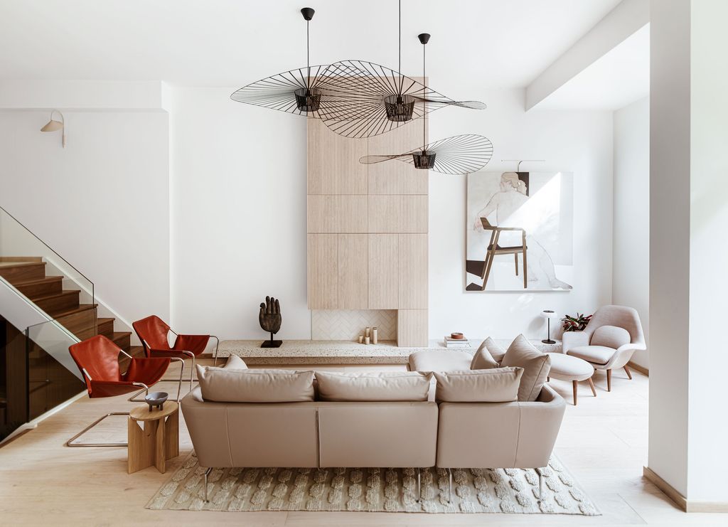 Image may contain Home Decor Architecture Building Furniture Indoors Living Room Room Interior Design and Table