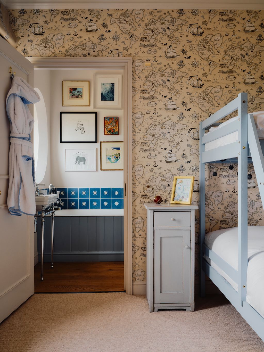 Image may contain Indoors Interior Design Bed Furniture Sink Art Painting Bedroom Dorm Room Room and Floor